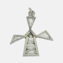 Colgante amuleto molino de viento con diamantes art déco