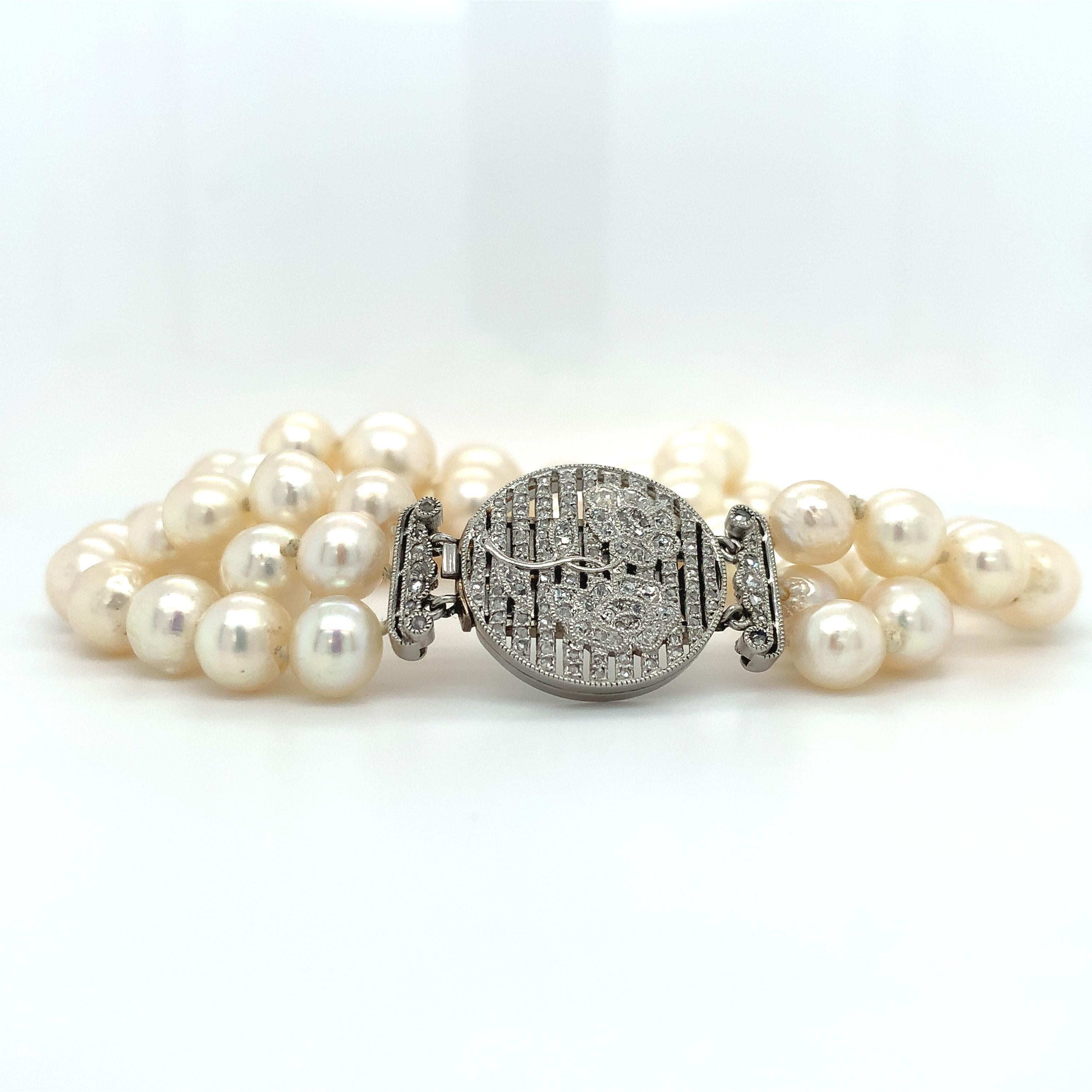 Taille ronde Bracelet Art déco à trois brins en platine, diamants et perles en vente