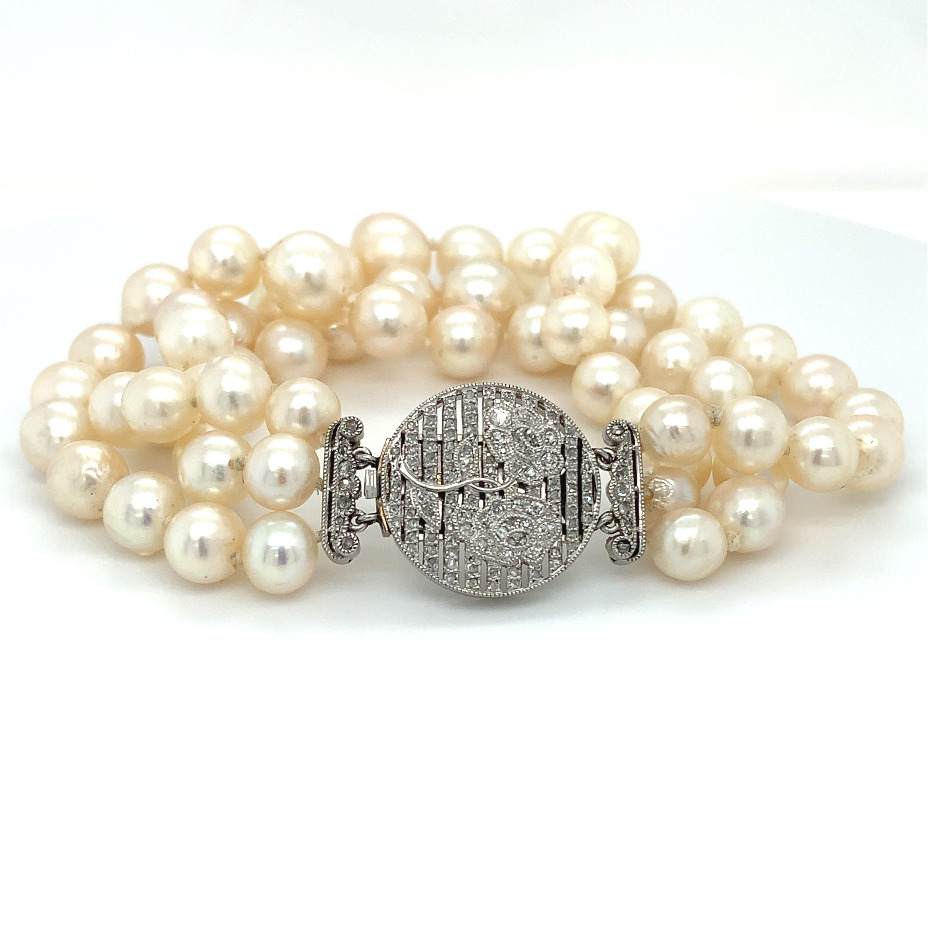 Women's Art deco diamonds and pearls triple strand bracelet platinum For Sale