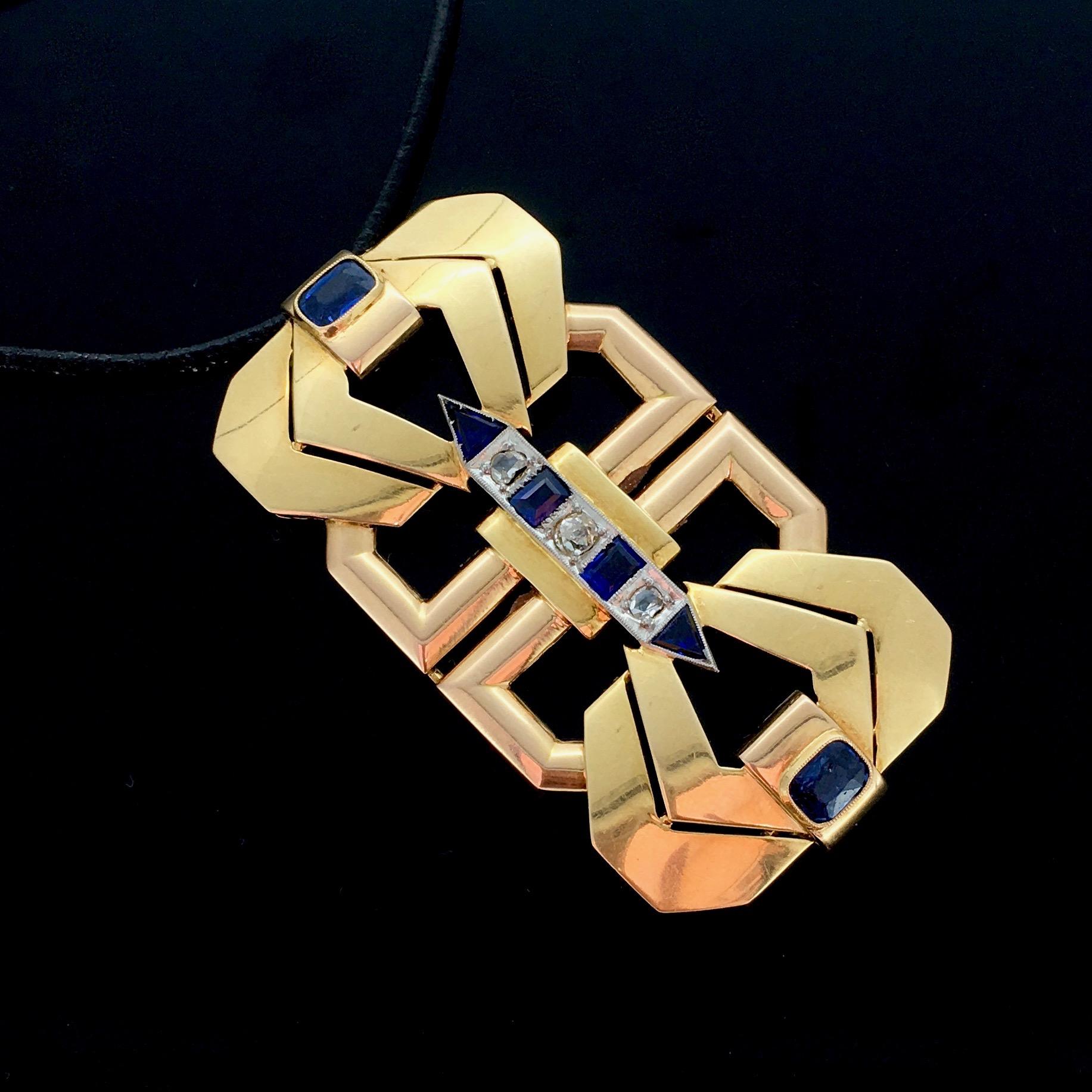 A fabulous Art Deco pendant. This one has a stunning geometric design. It is set with 3 old and rose cut diamonds (tcw : 0.60ct approximately) and with 6 natural sapphires : 2 ovals, 2 triangles and 2 tappers cut. The pendant was beautifully