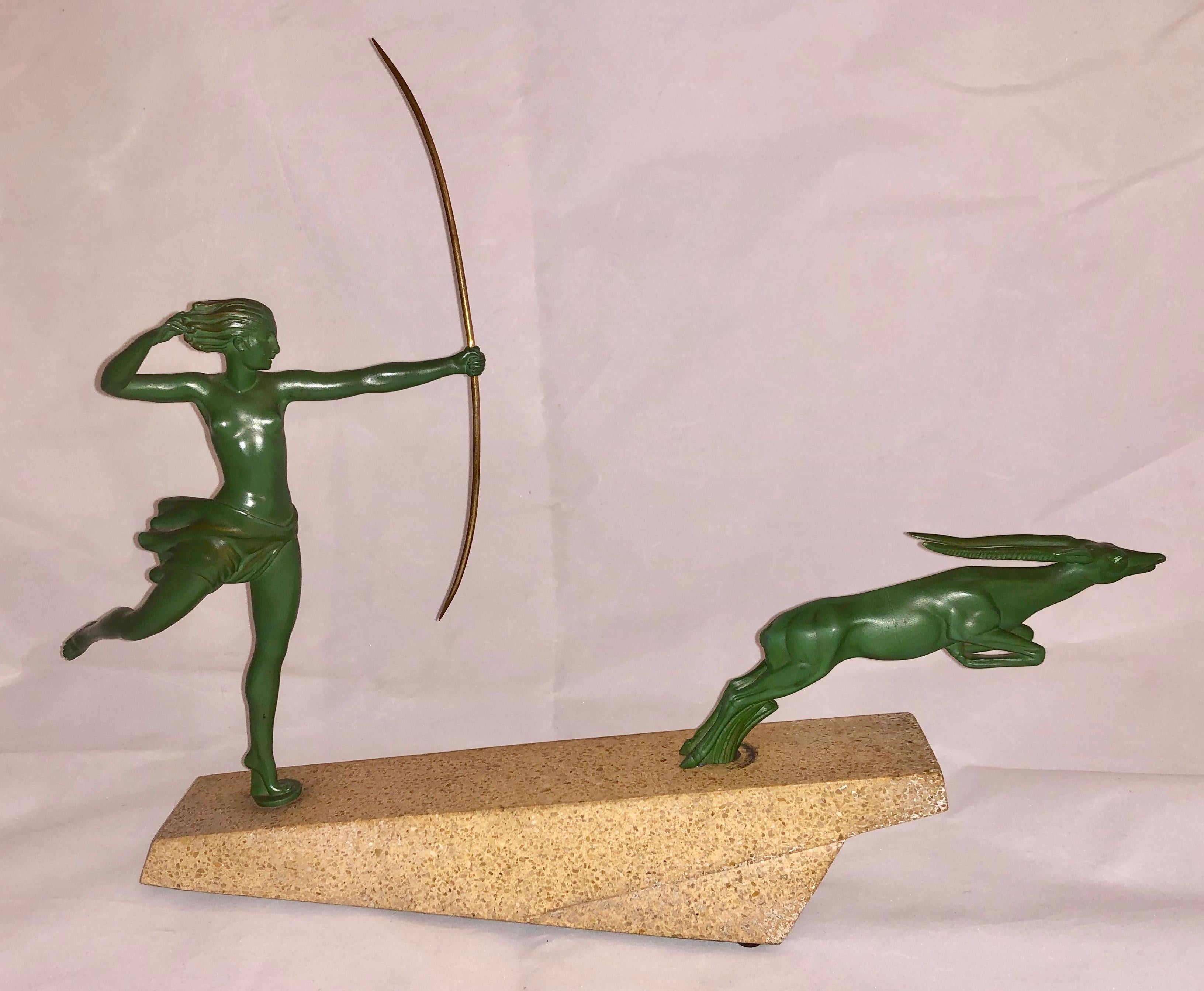 This is Diana the Huntress, a theme often repeated in Art Deco folklore. What makes this piece so spectacular: It has the style, small size and all the elements. The quality is of the best petite bronze metal with special green patina, very heavy