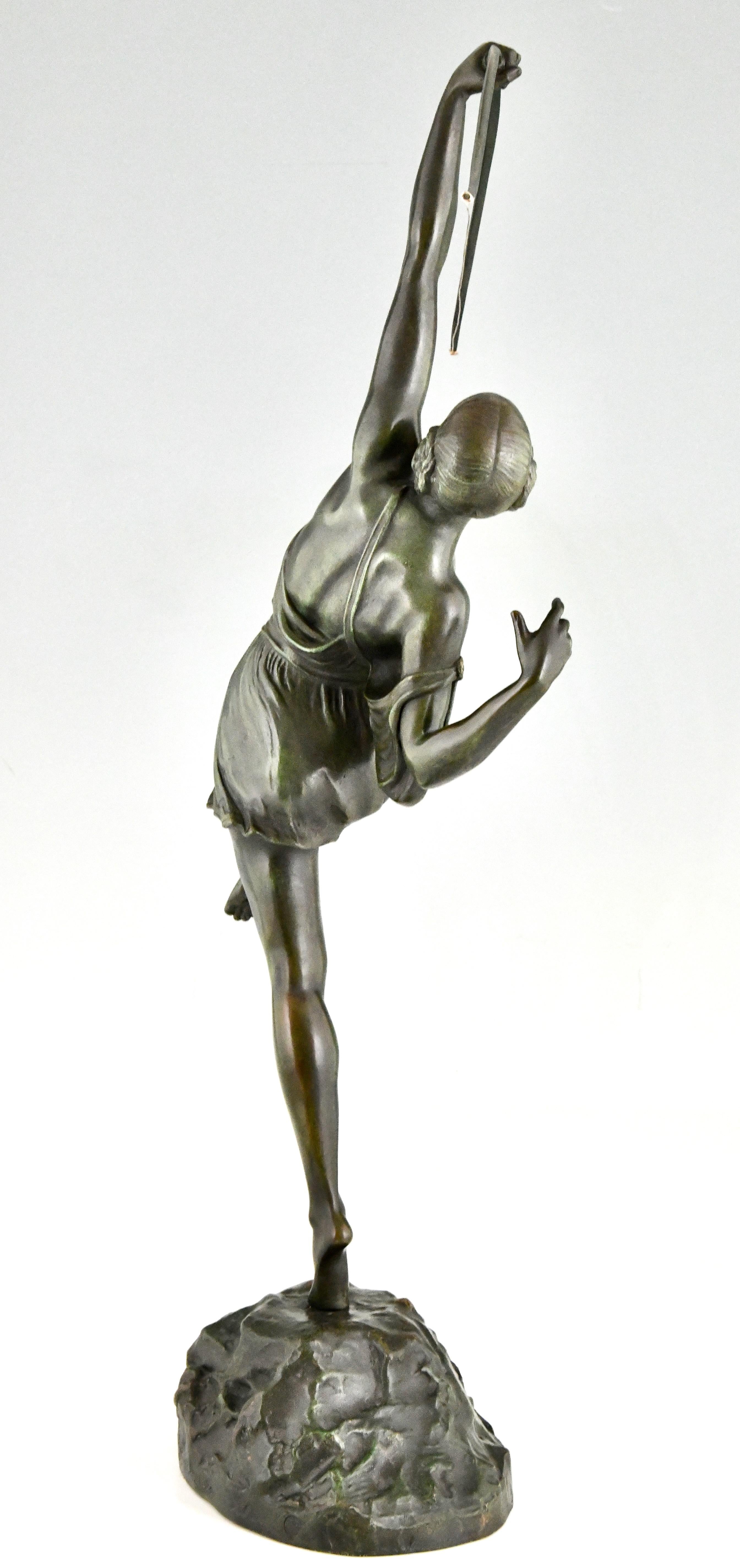 Patinated Art Deco Diana with bow bronze sculpture by Pierre Le Faguays France, 1925