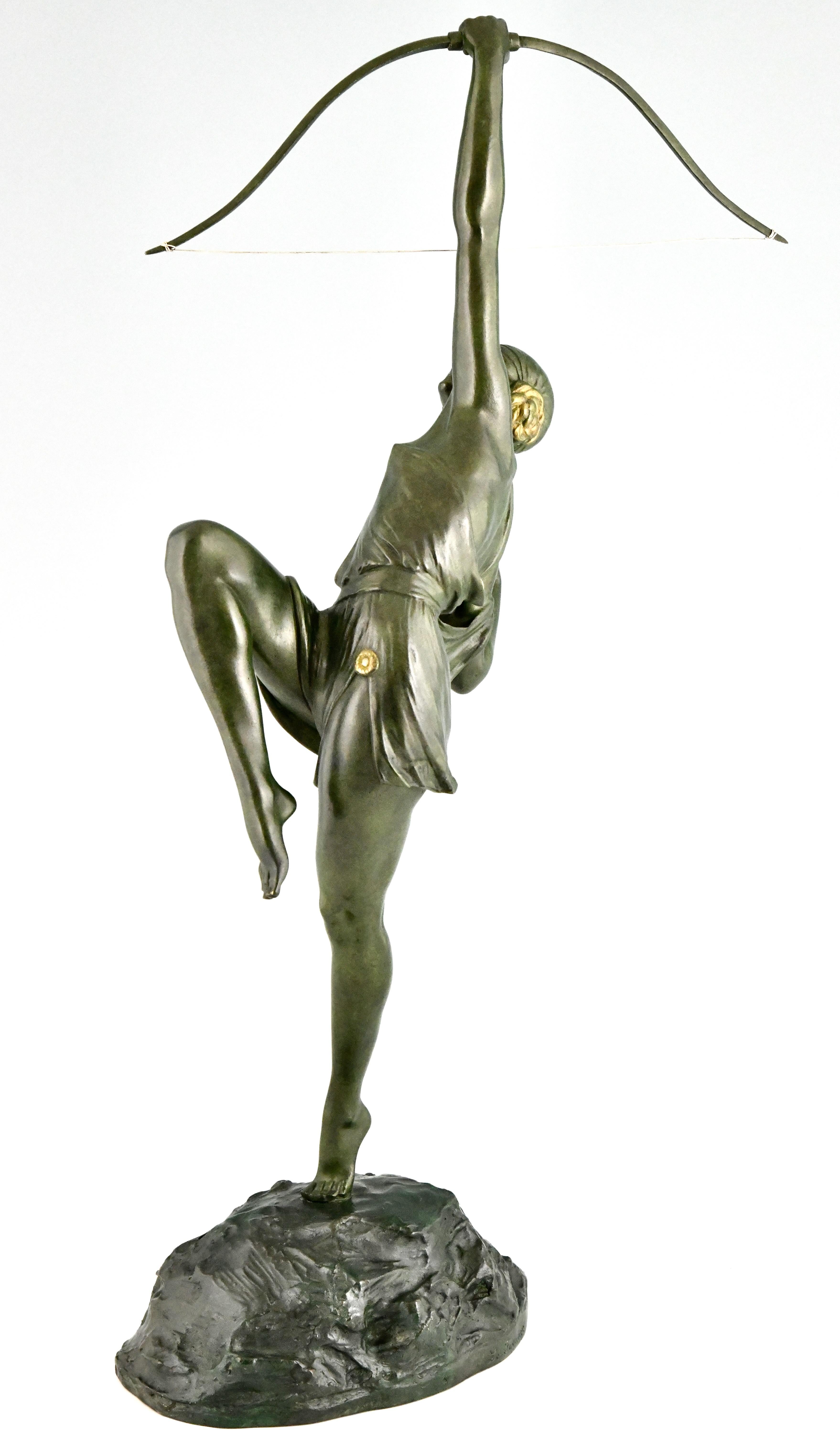 Patinated Art Deco Diana with bow bronze sculpture by Pierre Le Faguays France, 1925
