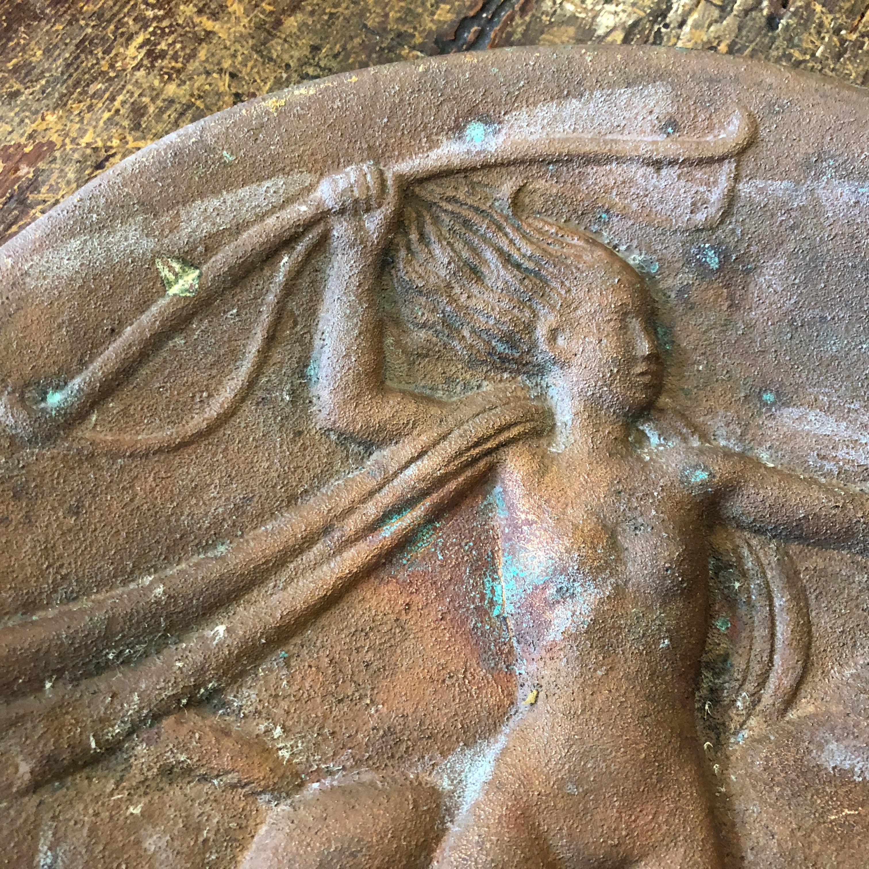 An art Deco bronze plate depicting Diana the goddess of hunting. Bronze is in original patina. It' made in Italy in the Thirties