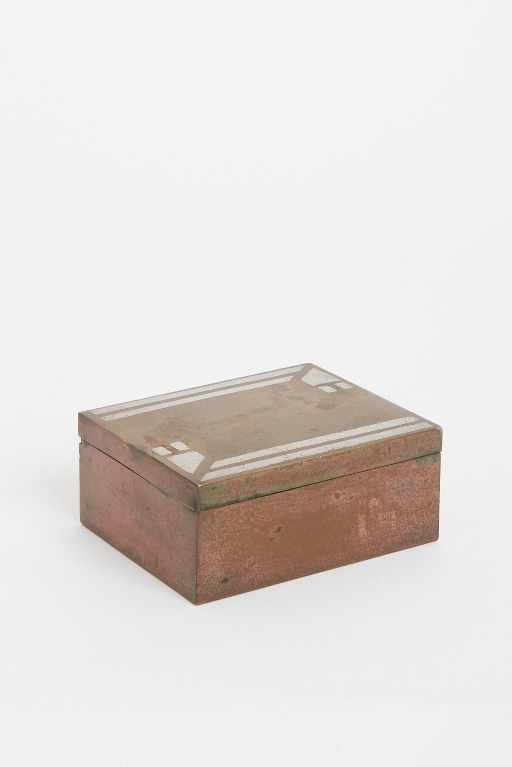 An Art Deco dinanderie brass box.
Signed J. Rodiere.
France, 1930s.
