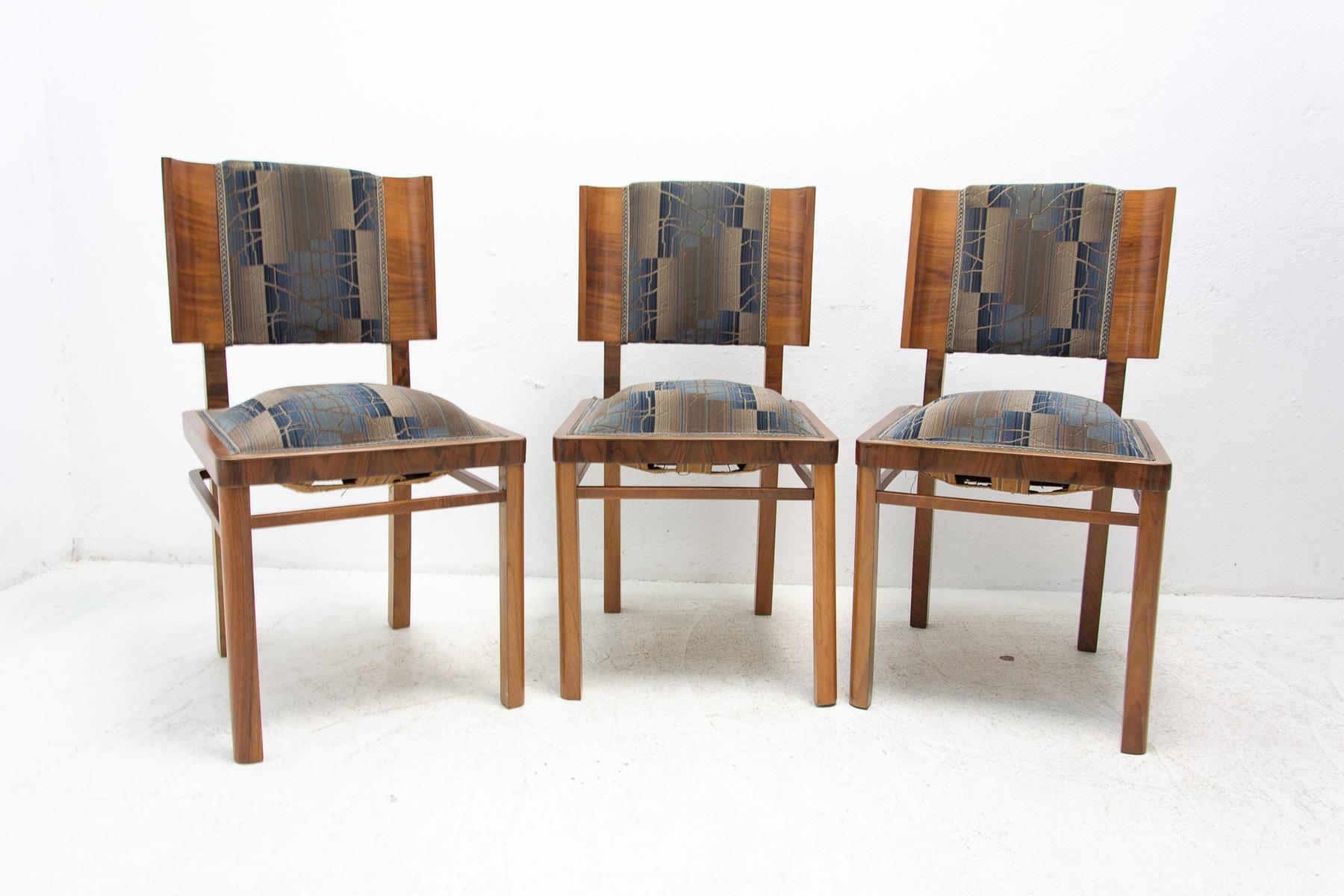 ART DECO chairs, made in the 1930s in the former Czechoslovakia. Made of walnut wood, veneered. The veneer is in excellent condition. The seats are slightly raised due to age, but they are comfortable. On one chair, the fabric is sewn up, as you can