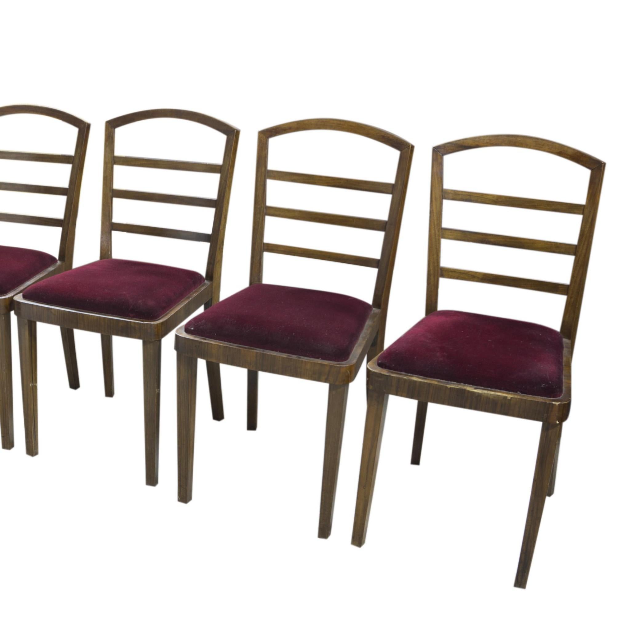 Set of six chairs Art Deco designed by Vlastmil Brožek, circa 1930´s, Czechoslovakia. Construction of massive wood. Walnut veneer. Preserved condition. In a few places a small chip of veneer. Dark red velvet, the upholstery in good preserved
