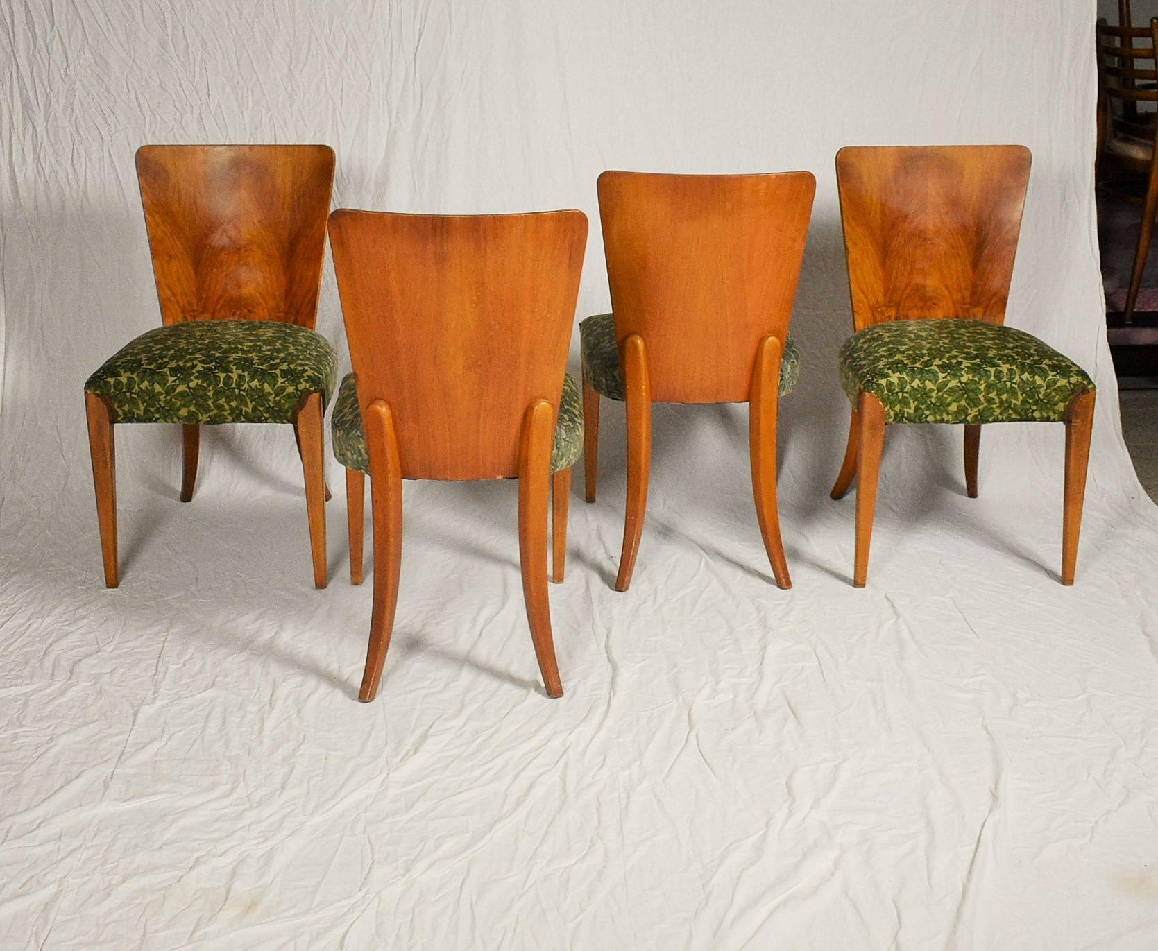Set of four dining chairs, catalog number H-214, designed by Jindrich Halabala in the 1930s, manufactured in ÚP Závody in the 1950s. The chairs are in good original condition. The wooden parts were polished. 
- cleaning