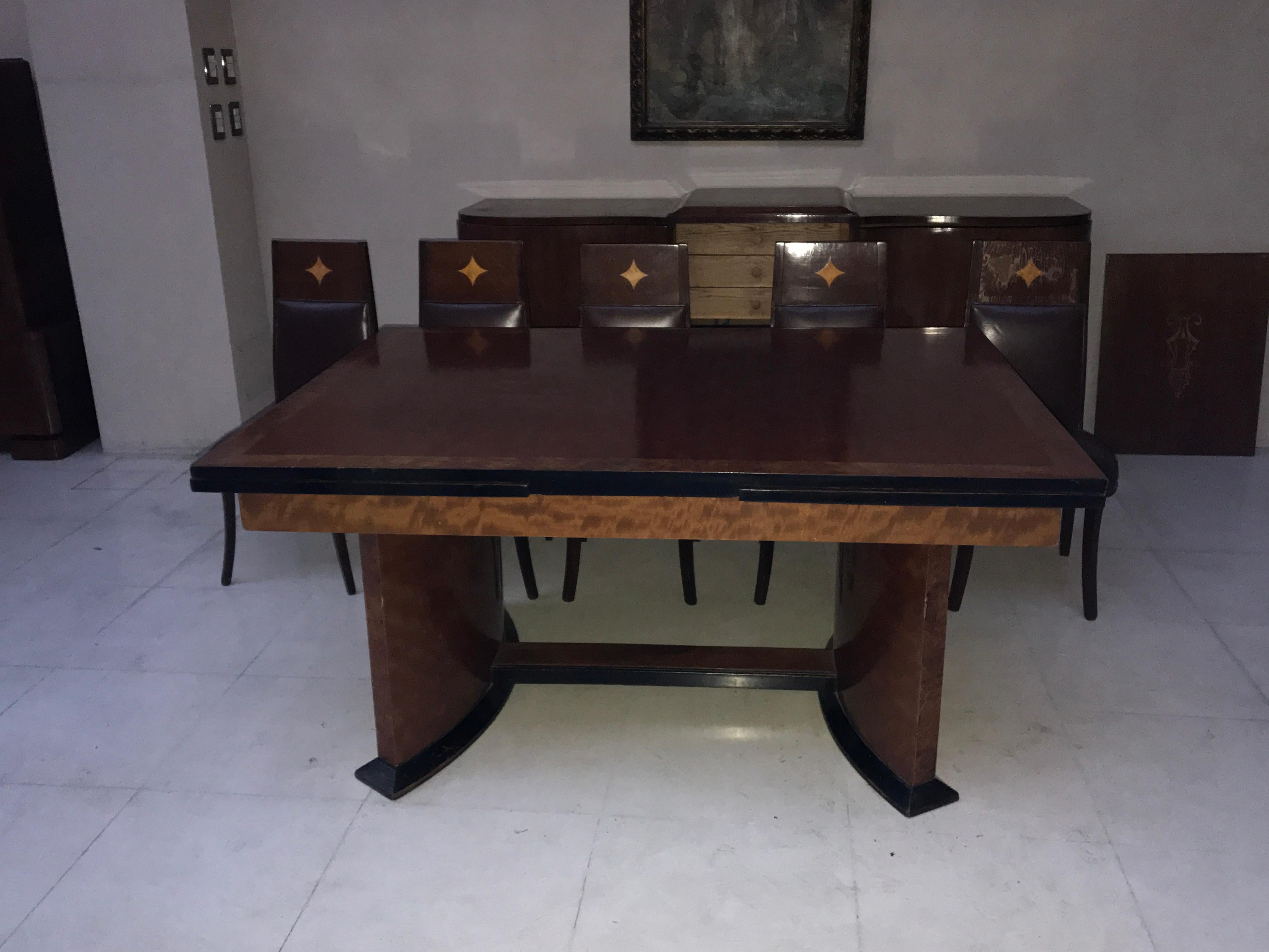 Dining table Art Deco with two extension boards

It is re-polished before delivery
Year: 1920
Country: French
Wood 
It is an elegant and sophisticated dining table.
You want to live in the golden years, this is the dining table that your project