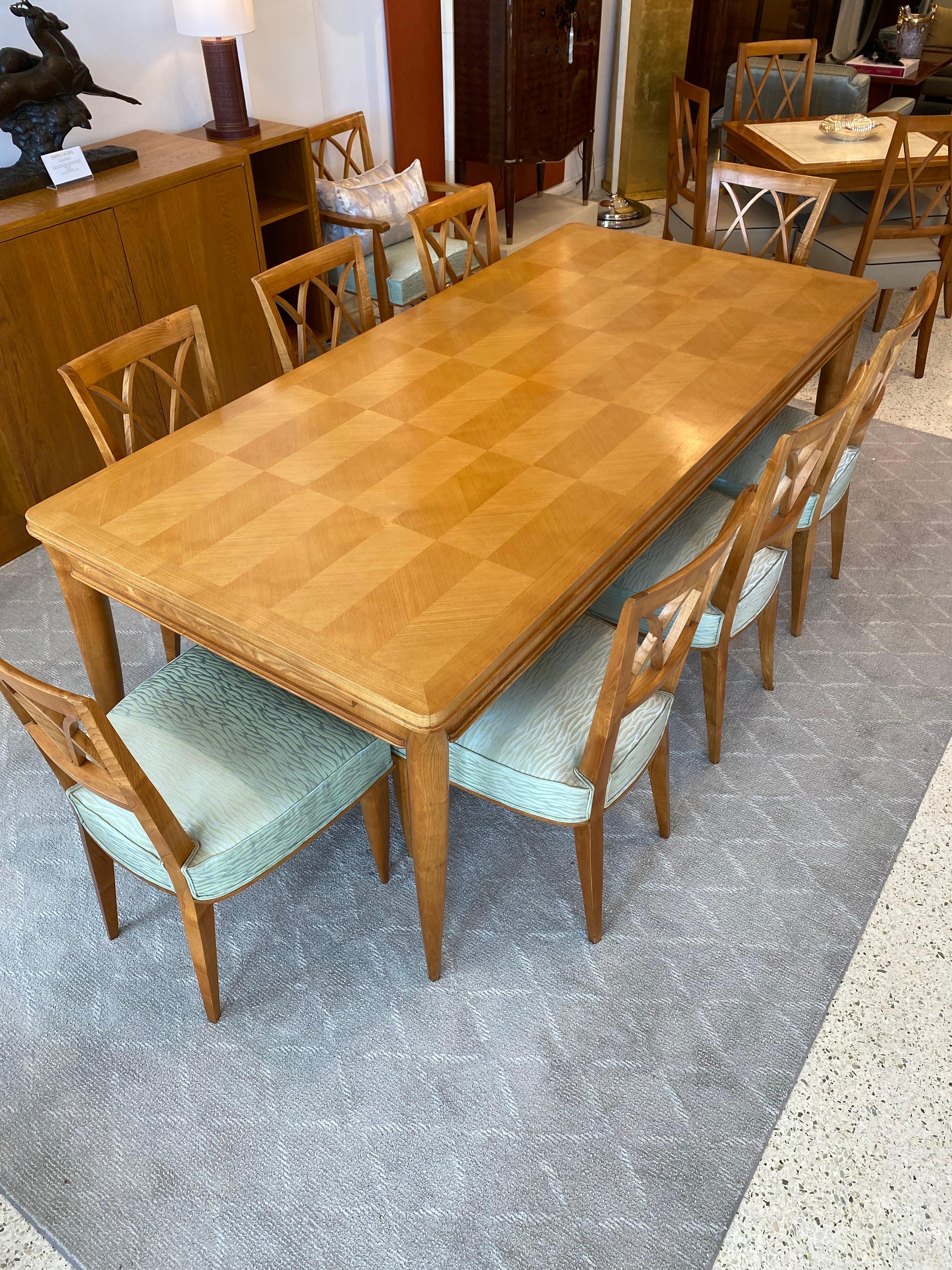 Oak Art Deco Dining Set (includes 12 chairs) by Baptistin Spade For Sale