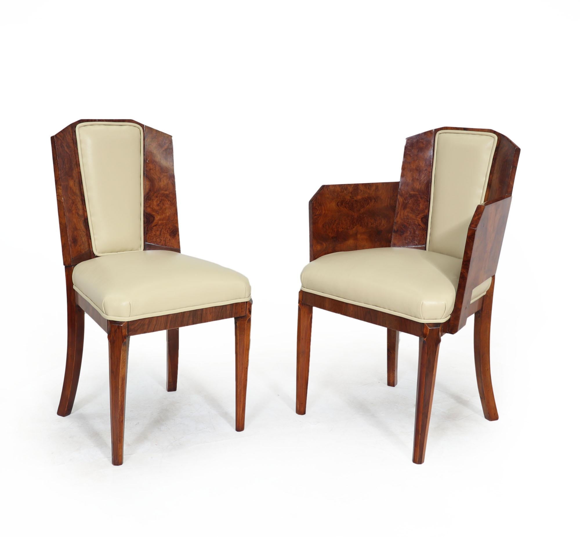 Chairs by Hille
This Art Deco dining table and chairs by Hille is the perfect way to add a touch of luxury to your home. produced in the 1930 by top cabinetmakers of this era the table has a cloud shaped top and two pedestal upright all in burr
