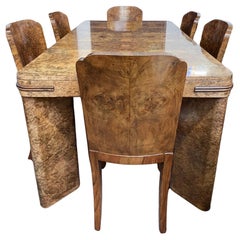 Table de salle à manger et six chaises Art déco par Maurice Adams