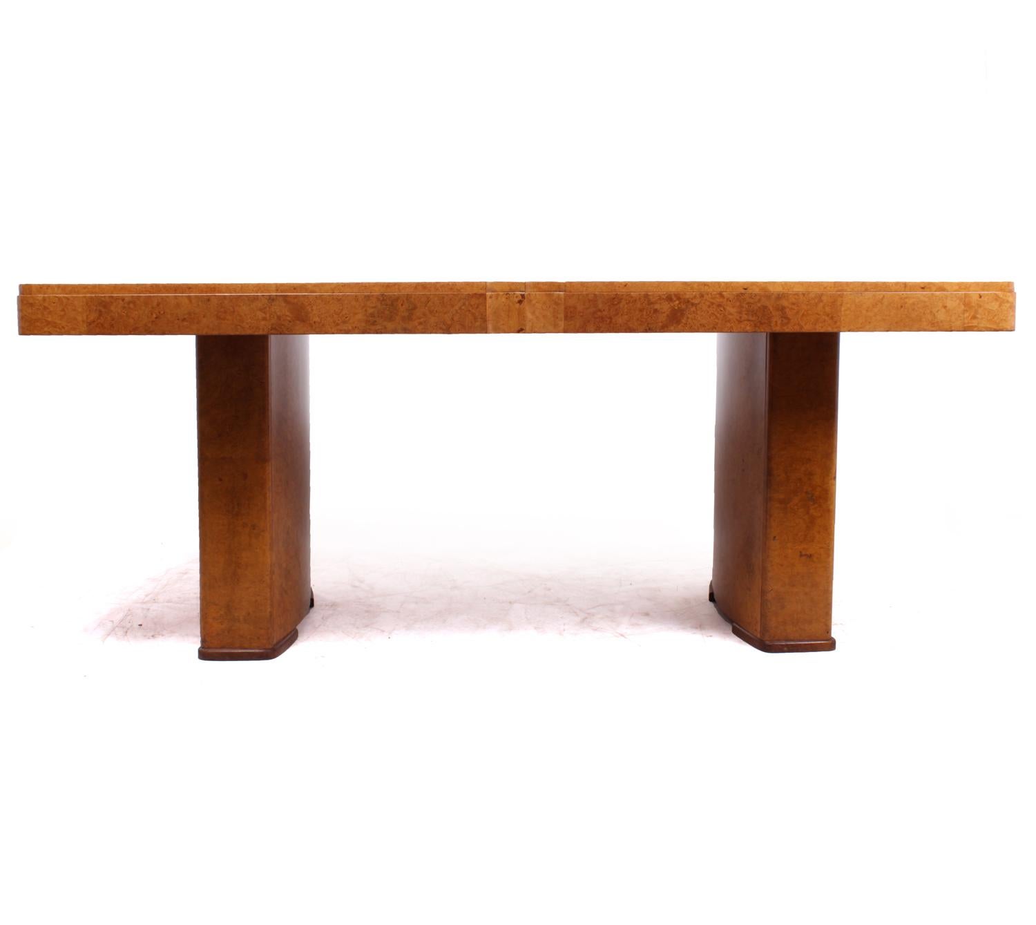 Art Deco dining table in burr maple
This burr maple dining table will comfortably seat 6 people it has two con-caved pedestals that are also burr maple, the table is in very good condition throughout and the top has been fully hand polished

Age: