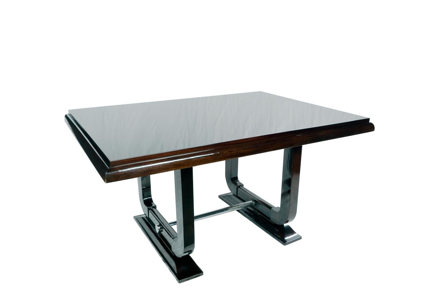 An exquisite dining table with proper varnish finish, chromed details and bar on the base, two extensions for larger service. 

Height: 75 cm (29.53 in)
Width: 97 cm (38.19 in)
Length:
Without extensions: 152 cm (59.84 in)
With one extension: 191.5