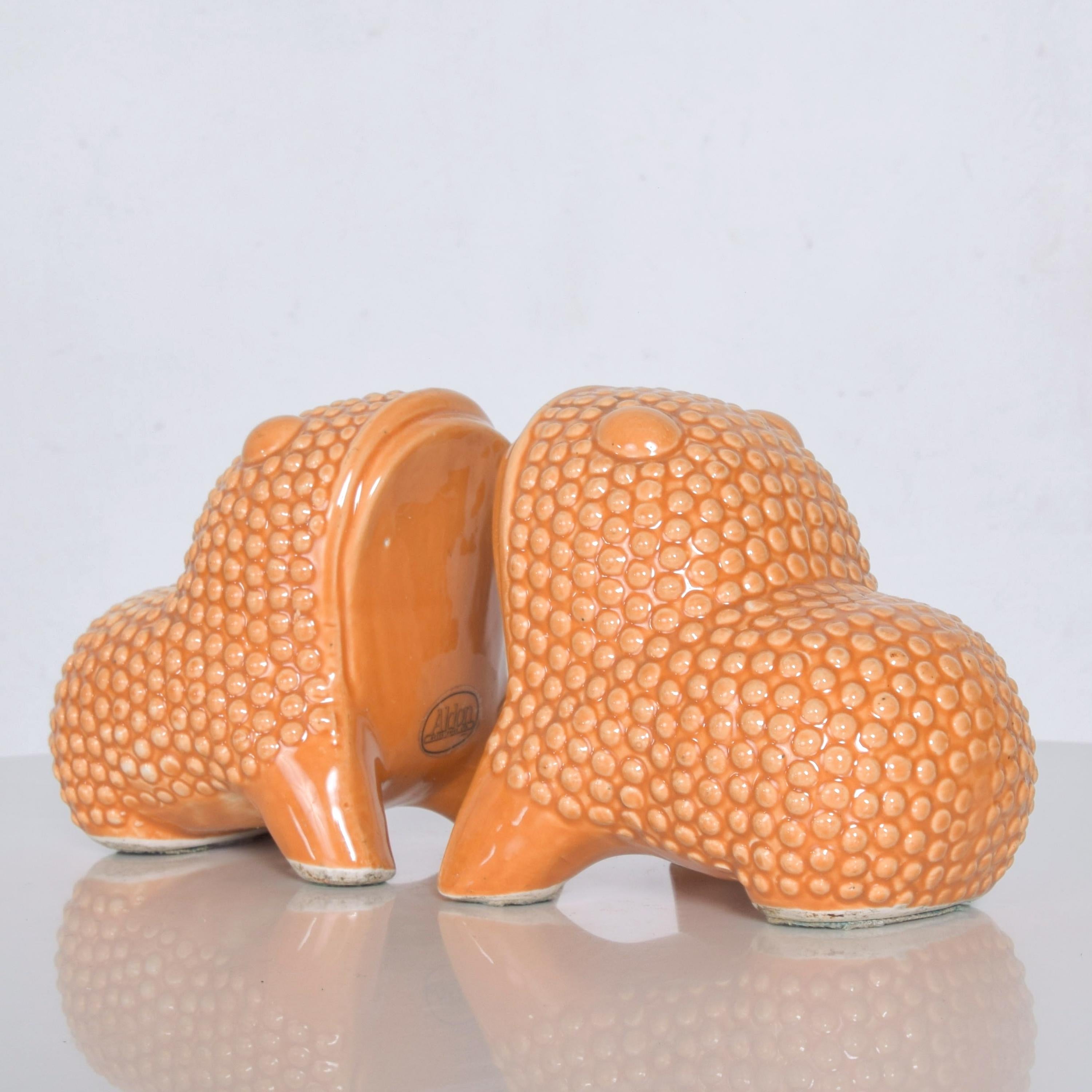 Adorable vintage orange dotted frogs fun pair of bookends, circa 1975
Set of bookends by ALDON Accessories made in Japan
Measures: 4 1/8