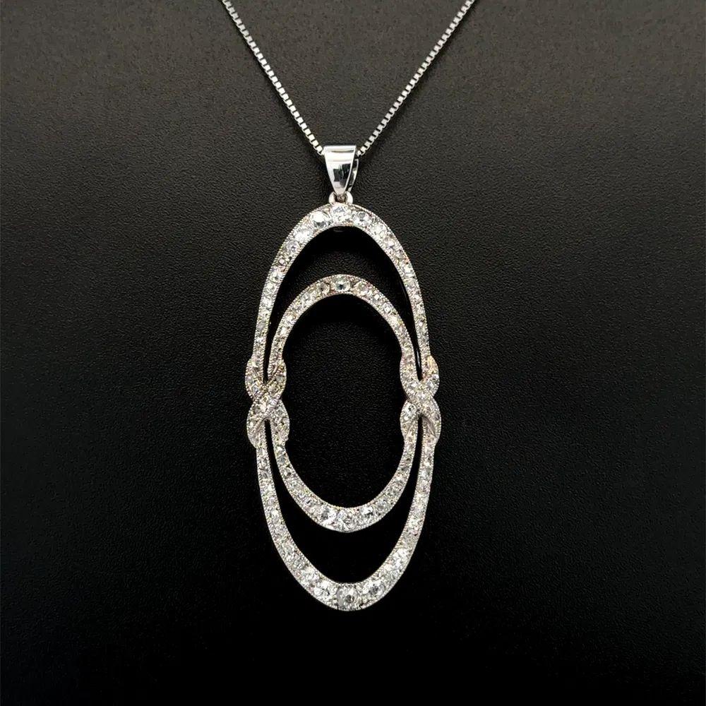 Taille ronde Collier pendentif fantaisie Art déco à double ouverture ovale en platine et diamants en vente