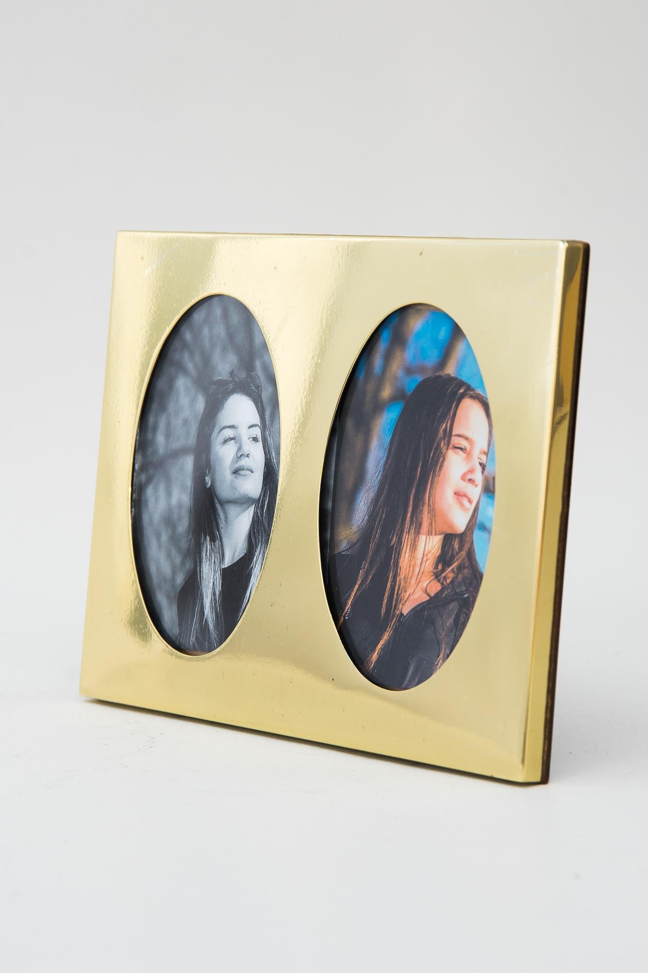 Art Deco double picture frame Vienna, around 1920s.
Polished and stove enameled
Picture inside are only for the photoshoot, they are not included.