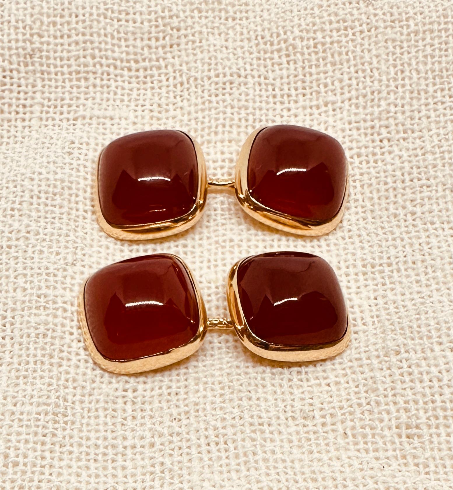 A wonderful pair of Art Deco cufflinks by renowned American maker Larter & Sons, who produced cufflinks and other fine jewelry for Tiffany & Co and many other famous New York retailers.

These feature four square cabochon-cut carnelian stones set in