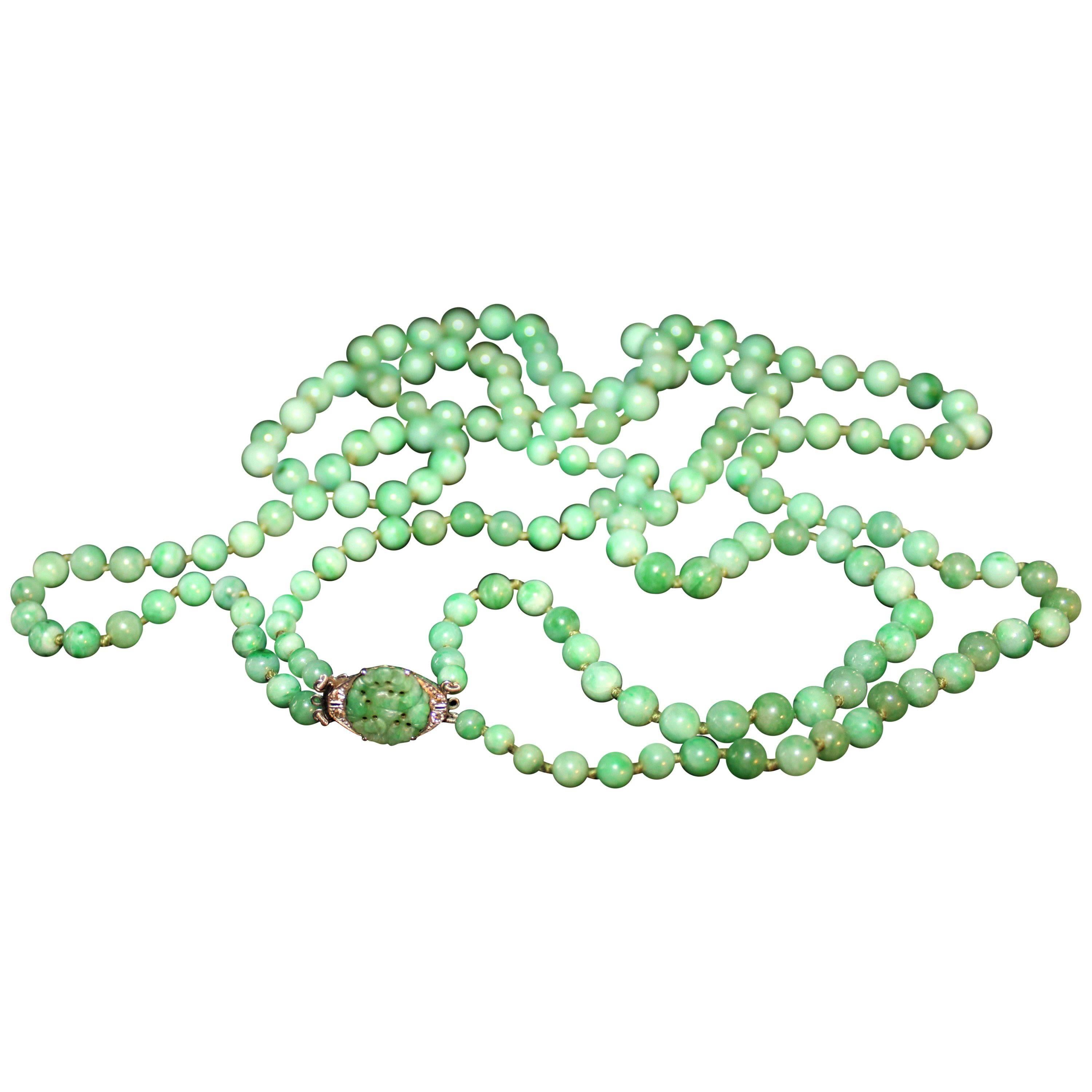 Art Deco Double Strand Jade Graduated Bead Necklace with 18-Karat Gold Clasp For Sale