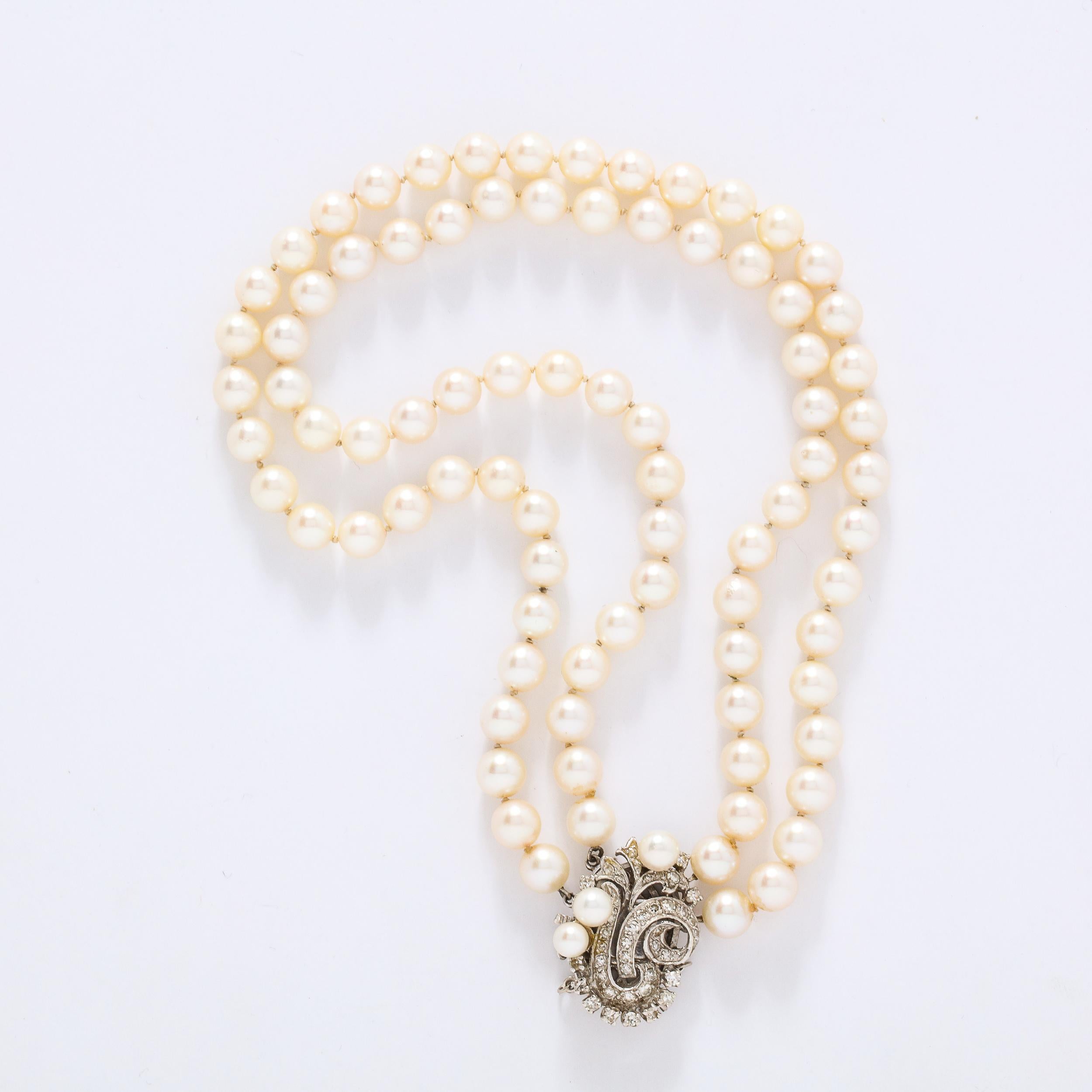 Women's Art Deco Double Strand Pearl Necklace with 14kt Gold, Diamond and Pearl Clasp For Sale
