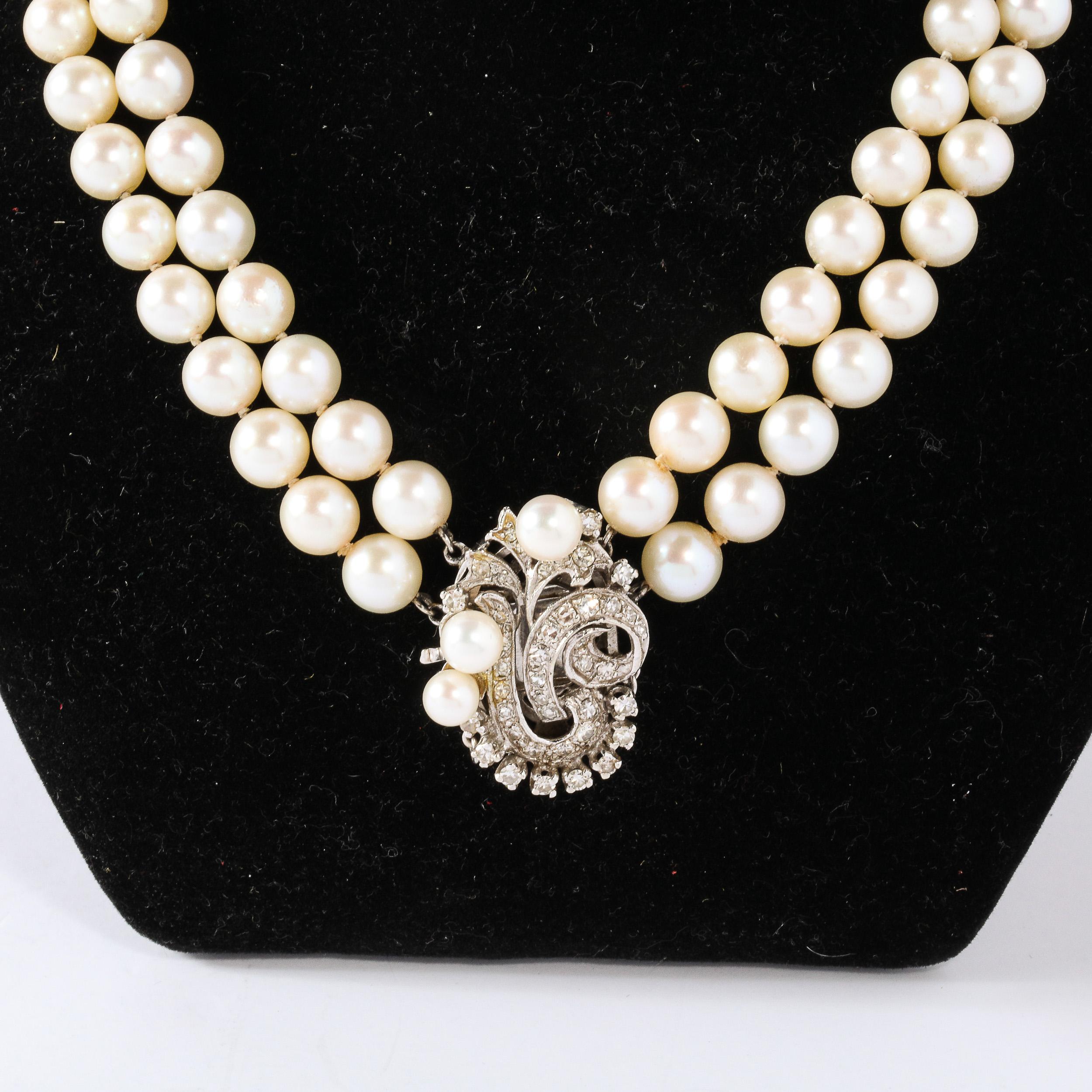 Art Deco Double Strand Pearl Necklace with 14kt Gold, Diamond and Pearl Clasp In Excellent Condition For Sale In New York, NY