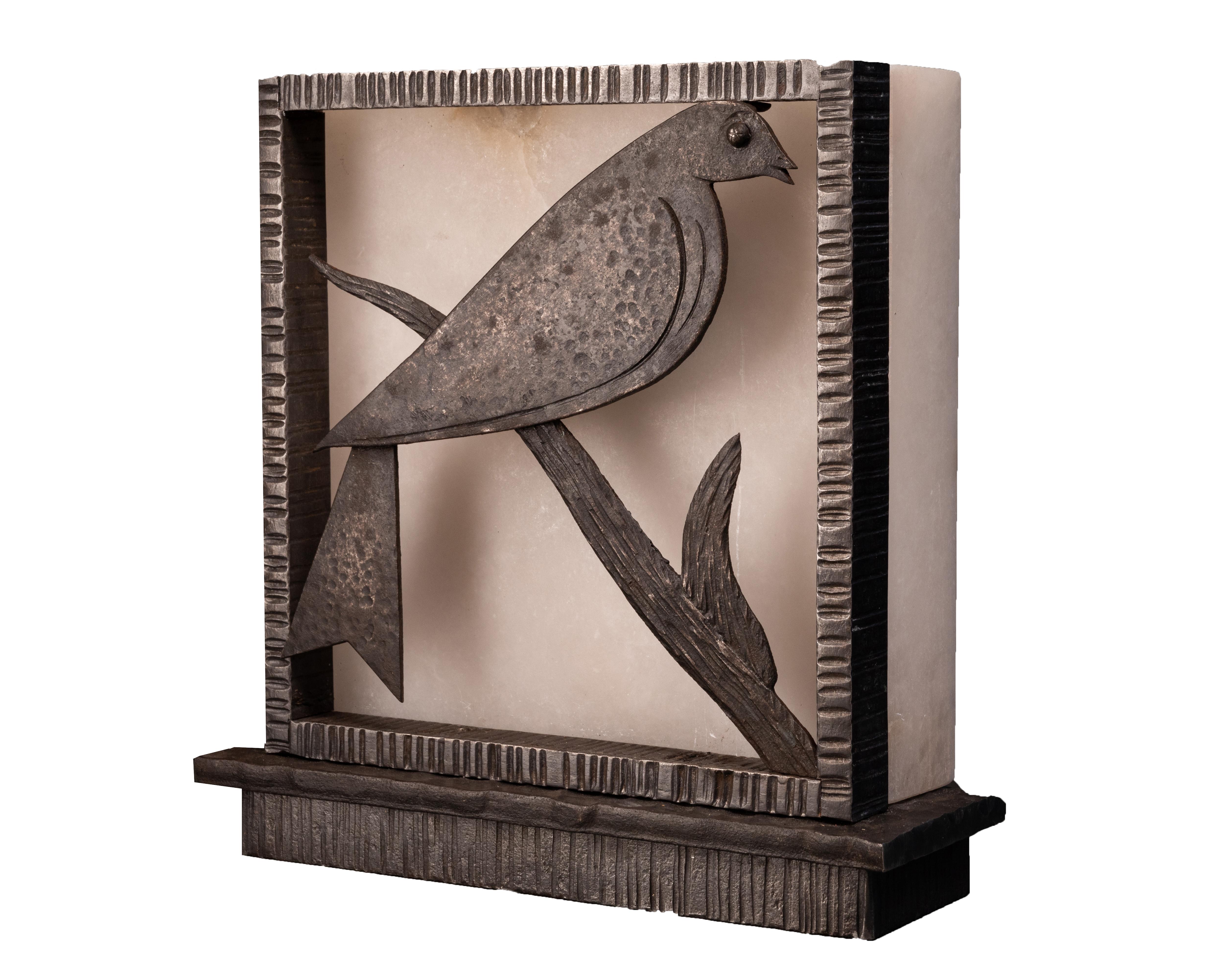 Art Deco dove lamp or sconce in wrought iron and alabaster by Edgar Brandt (more about the artist below).

Animal sculpture Art Deco lamp (or wall lamp) decorated with a dove in hammered and chiseled wrought iron.

A contemporary alabaster box