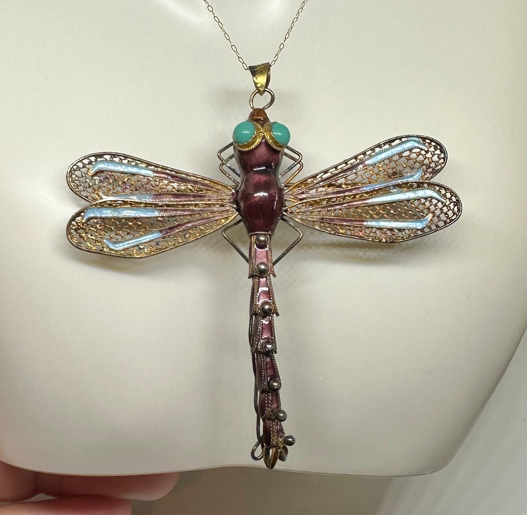 INDULGE IN AN ANTIQUE ART DECO - ART NOUVEAU CHINESE EXPORT DRAGONFLY INSECT PENDANT OR BROOCH WITH GORGEOUS NATURAL TURQUOISE CABOCHON EYES WITH EXQUISITE ENAMEL DECORATION IN SILVER GILT.
The stunning effect of the gorgeous natural turquoise and