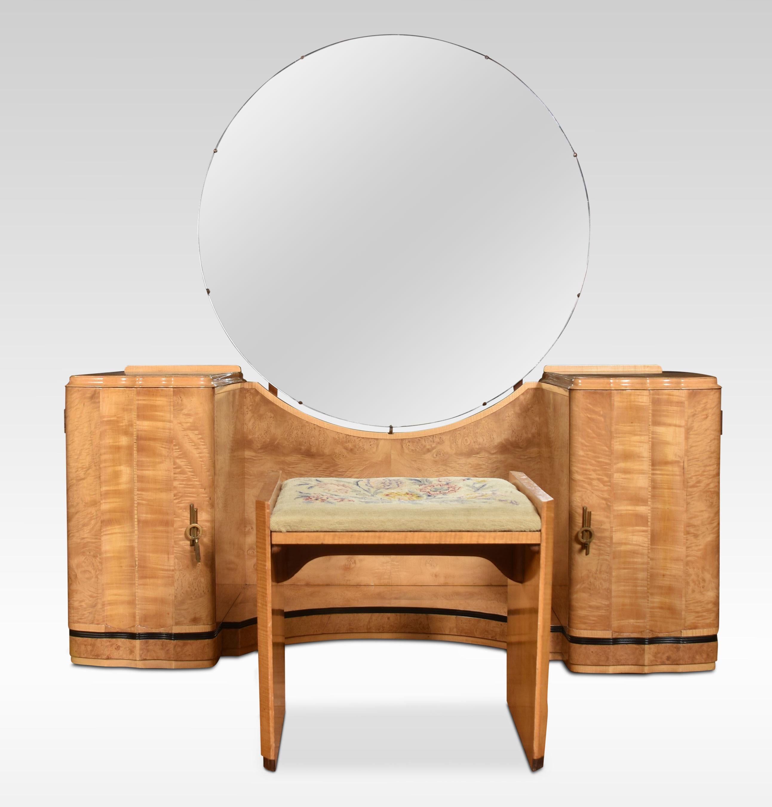 Art Deco dressing table with original round adjustable mirror. To The base having twin pedestals and original brass handles opening to reveal three drawers in one pedestal the other with fitted shelf. All raised up on plinth base. Together with