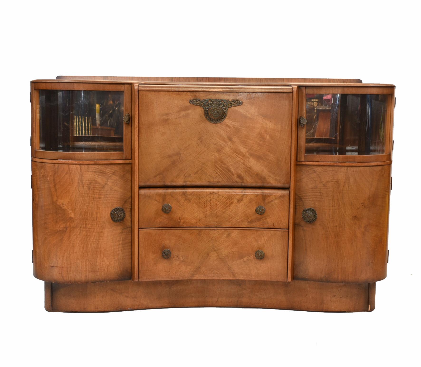 Cool period Art Deco drinks or cocktail cabinet
Circa 1930 on this wonderful piece
Opens out to reveal drink mixing section
Lots of storage with drawers and cupboards
Viewings available by appointment
Offered in great shape ready for home use