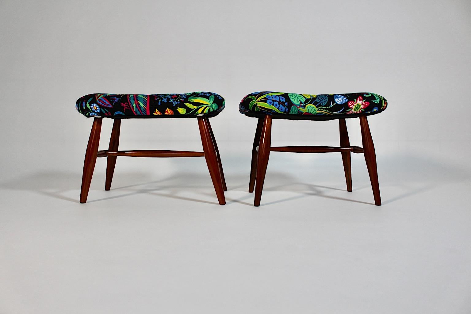 Art Deco Duo pair of stool or footstools from cherry and black floral textile fabric attributed to Josef Frank circa 1928 Austria.
A stunning duo or pair of stools design attributed to Josef Frank circa 1928 from cherrywood and reupholstered with