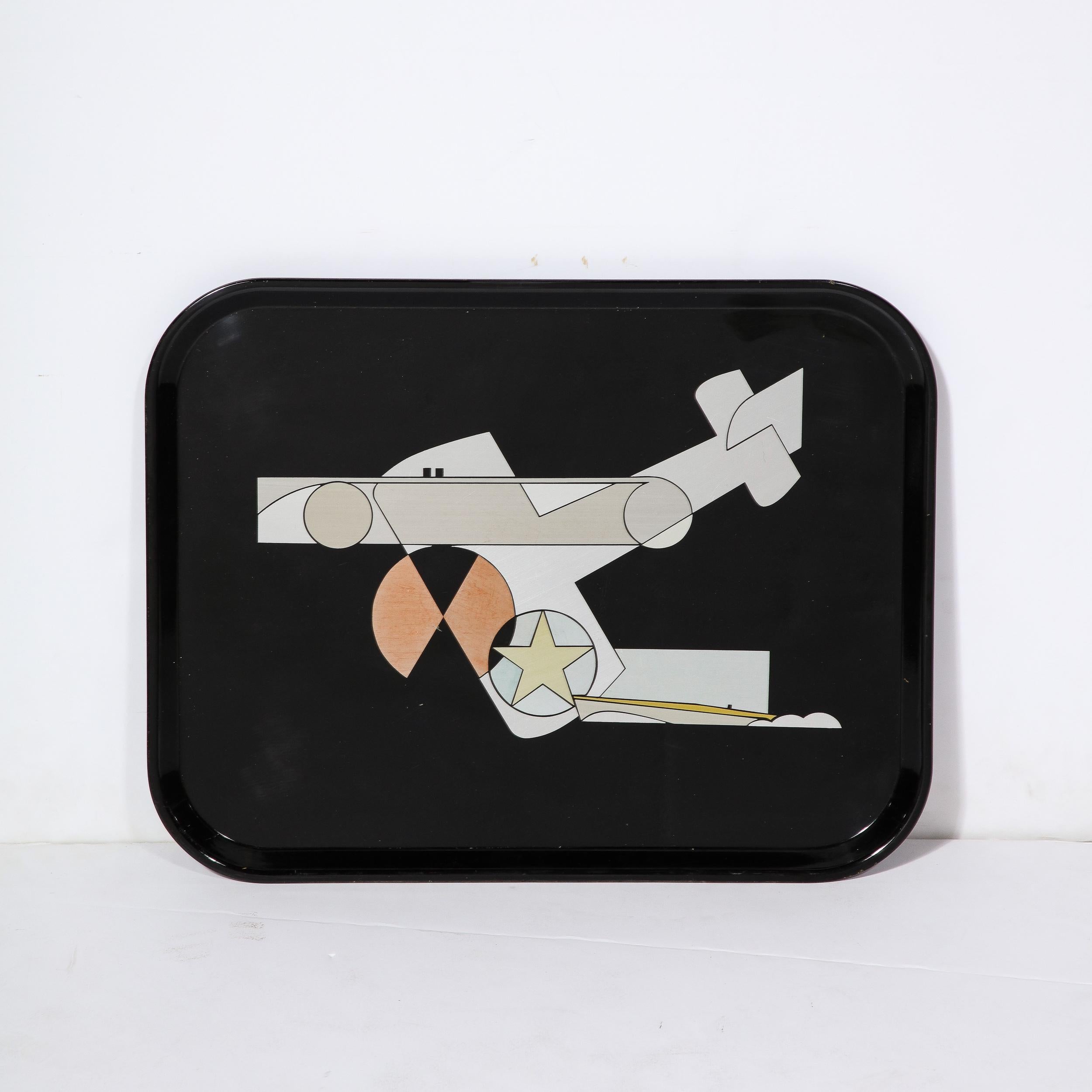 This serving tray is a pre-war icon and design masterpiece, designed by George Switzer (1890-1955) for Westinghouse in 1932. Bearing a geometric image of three staples of industrial machinery (a racing car, speed boat, and biplane plane), this