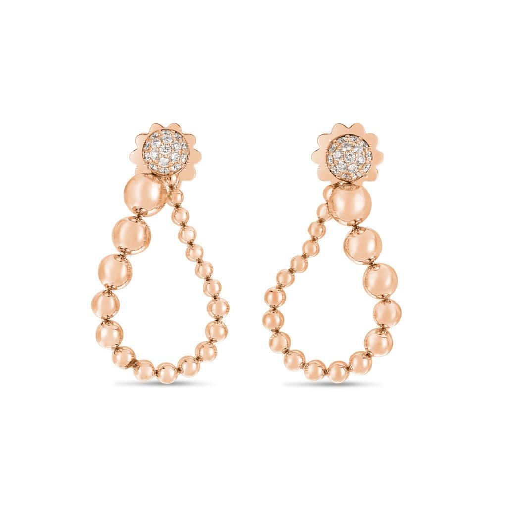 DIAMONDS GIVE LIGHT TO THESE SPECIAL EARRINGS BY ROBERTO COIN, FEAUTURING 18KT ROSE GOLD AND ALL THE UNIQUENESS OF A HANDMADE CREATON.

Art Deco earrings 18kt rose gold with diamonds.

Earring converts from hoop to shoulder duster.
Earrings