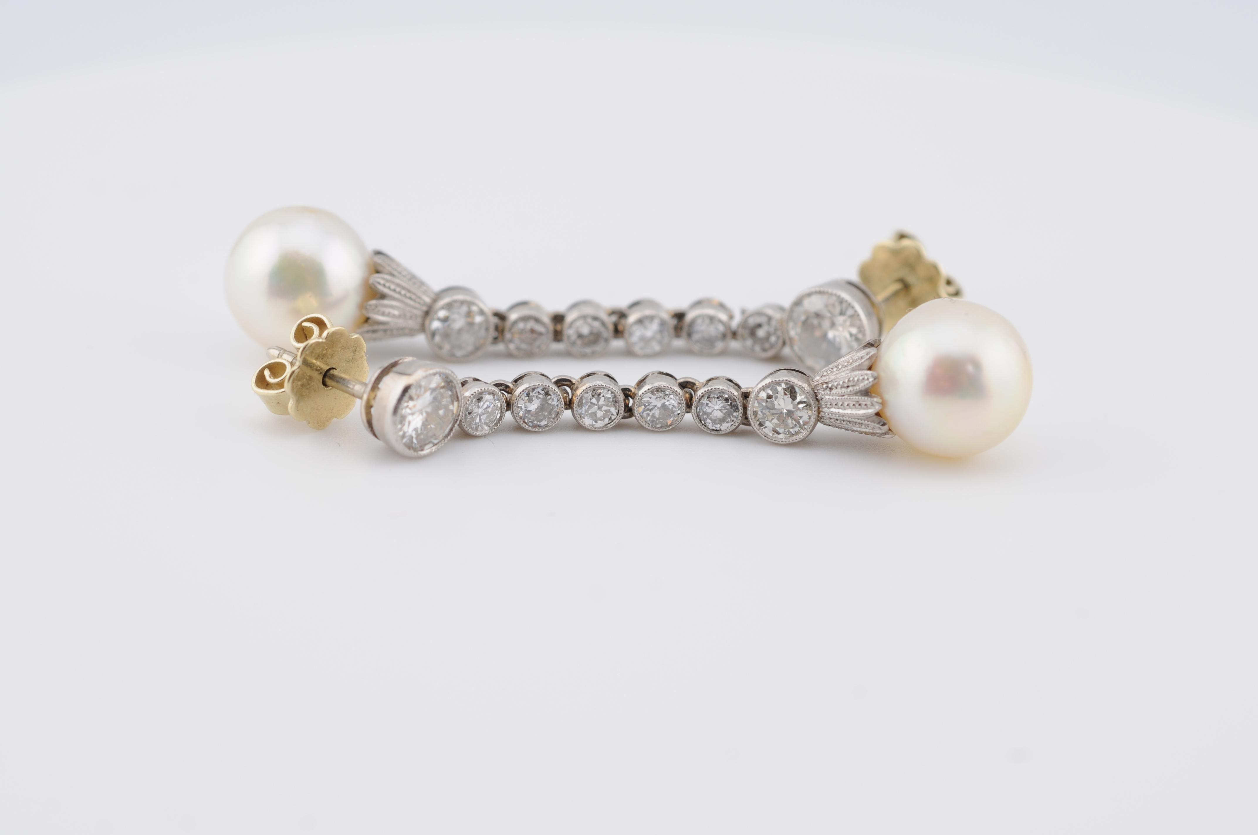 Boucles d'oreilles Art Déco en or blanc et jaune 18 carats avec diamants taille ancienne et perles de culture des mers du Sud

Une paire d'élégantes boucles d'oreilles Art déco en or blanc et jaune 18 carats, présentant un mélange harmonieux de