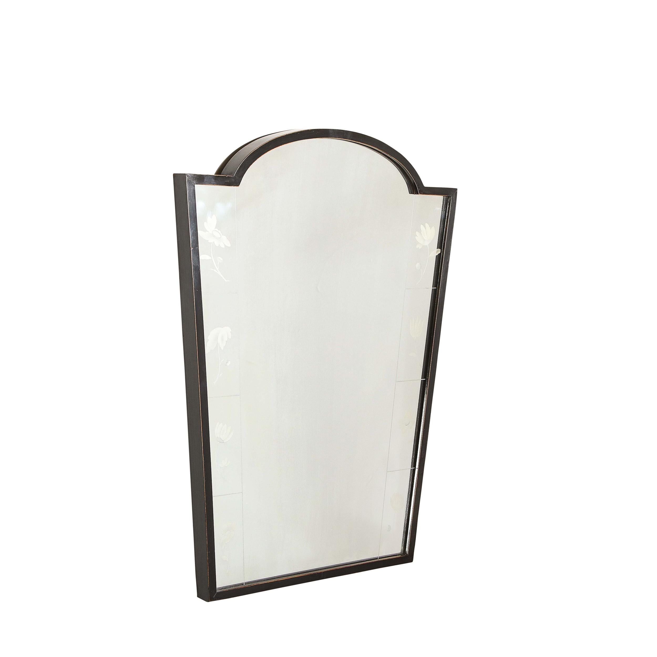 This stunning and refined Art Deco wall mirror was realized by the legendary designer Luigi Brusotti in Italy circa 1935. It features a skyscraper style form with a rhombus body that tapers to its base with acute angles at each corner, and a convex