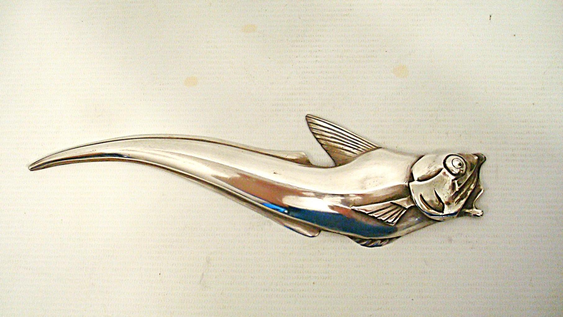 Art Deco Édouard Marcel Sandoz Bronze Macrurus Desk Letter Opener.

Édouard Marcel Sandoz's Art Deco letter opener is a unique piece distinguished by its ingenious silver fish design. The piece is crafted from silver-plated bronze, giving it an