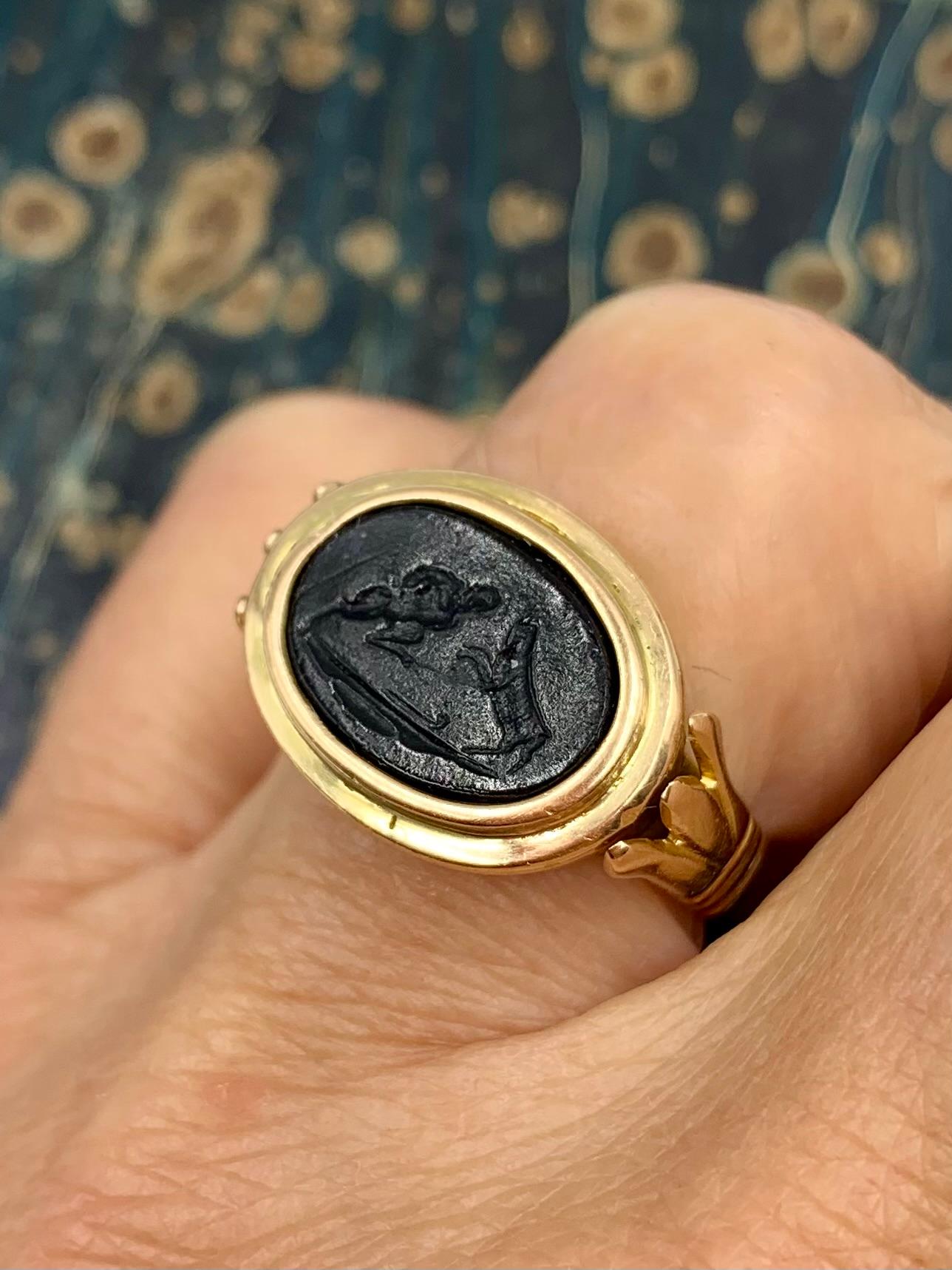 Art Deco Egyptian Revival 14K Yellow Gold Satyr and Goat Tassie Oval Signet Ring In Good Condition For Sale In New York, NY