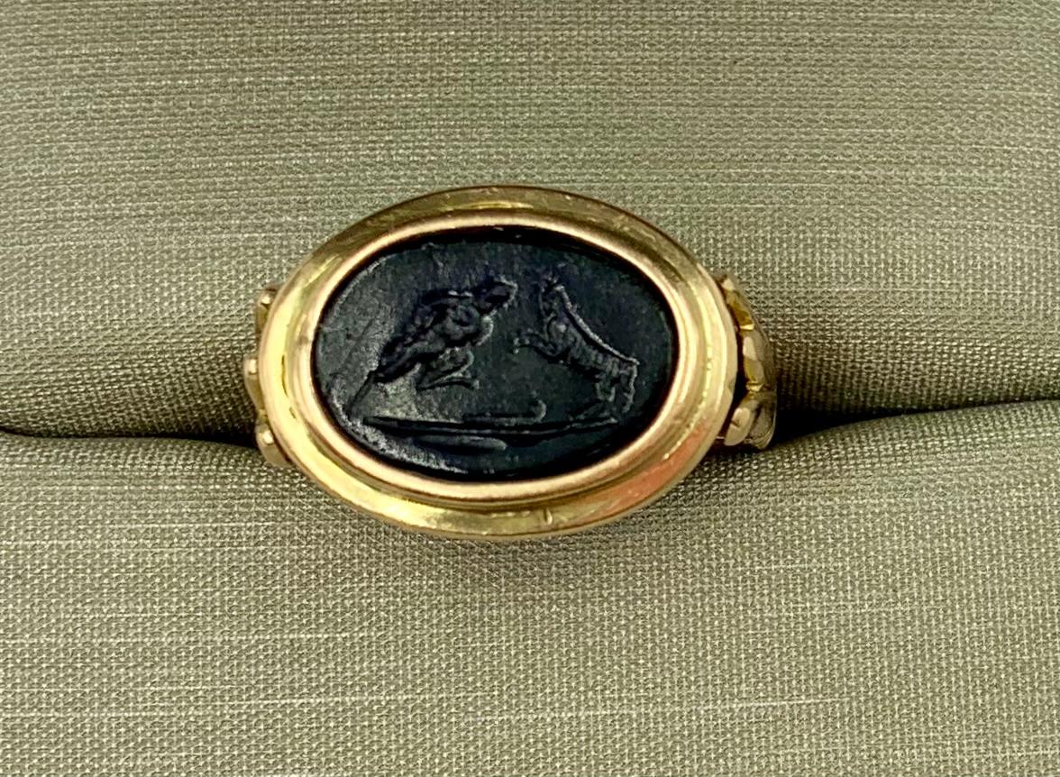 Women's or Men's Art Deco Egyptian Revival 14K Yellow Gold Satyr and Goat Tassie Oval Signet Ring For Sale