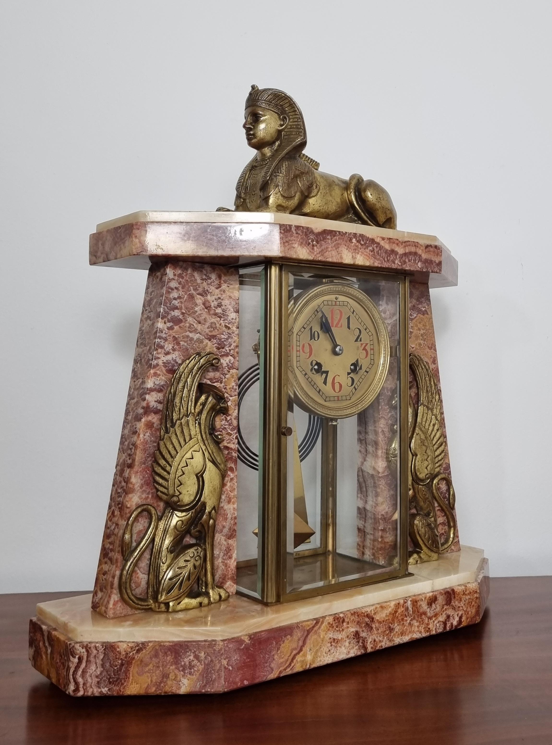 Cast Art Deco Egyptian Revival Clock Set with Pair of Obelisks For Sale