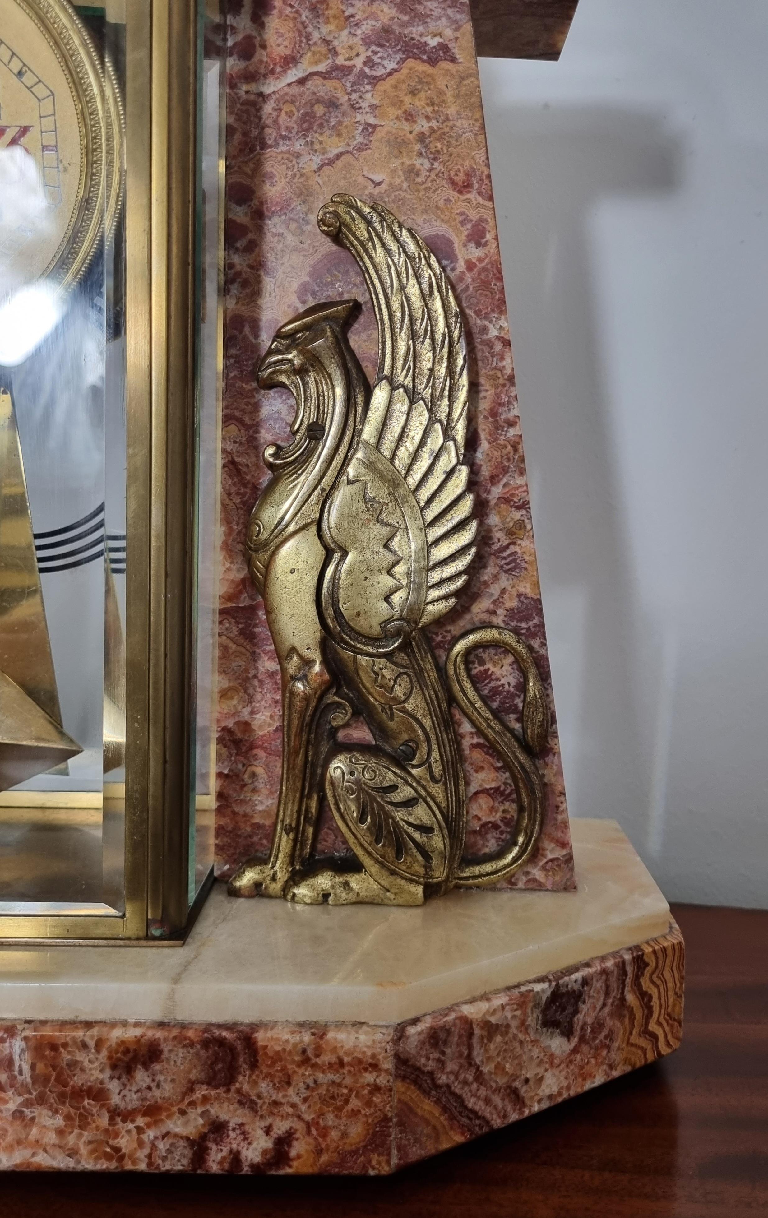 Bronze Art Deco Egyptian Revival Clock Set with Pair of Obelisks For Sale