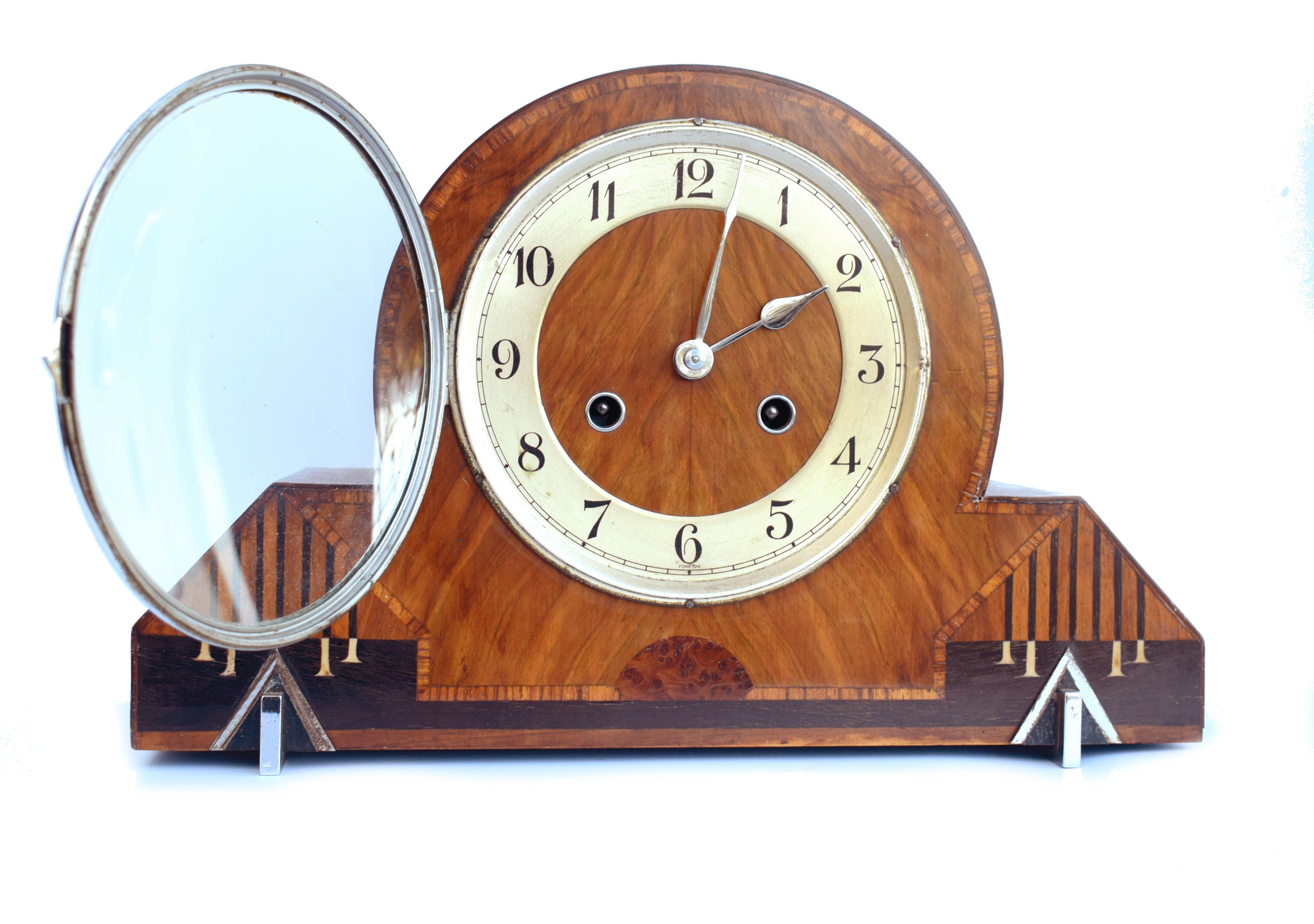 For your consideration is this very good quality and extremely attractive Art Deco mantle clock made in Germany and dating to the 1930's by Thomas Haller. The casing is the real hero of this timepiece, great size with nicely figured walnut veneered
