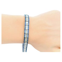 Elegancia Art Decó: Pulsera de platino, diamantes y zafiros