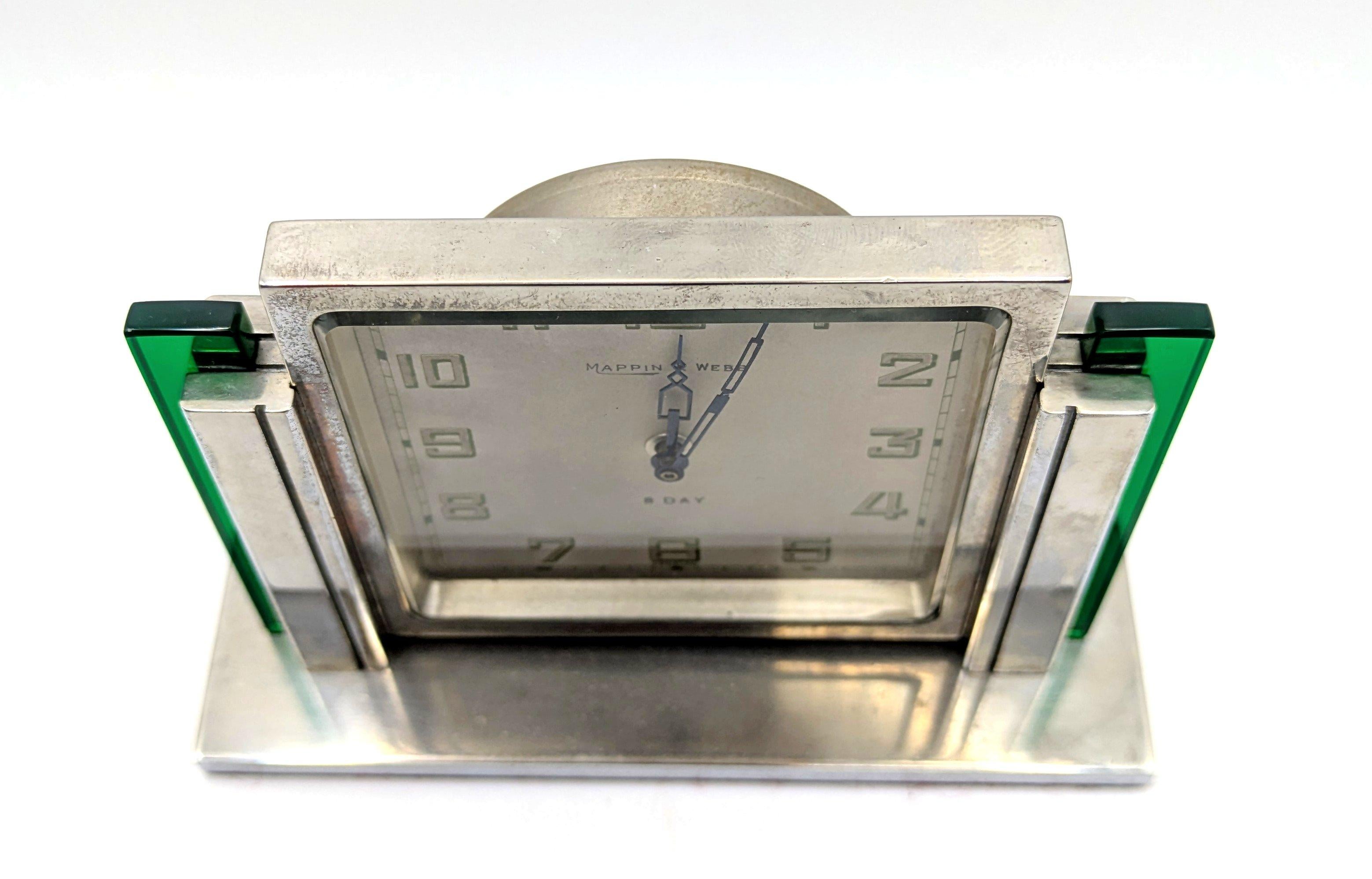 This refined Art Deco chrome desk clock by the renowned British silversmiths Mappin & Webb showcases the brand’s timeless craftsmanship and classic design. Its sleek, understated form reflects early 20th-century elegance, making it an ideal addition