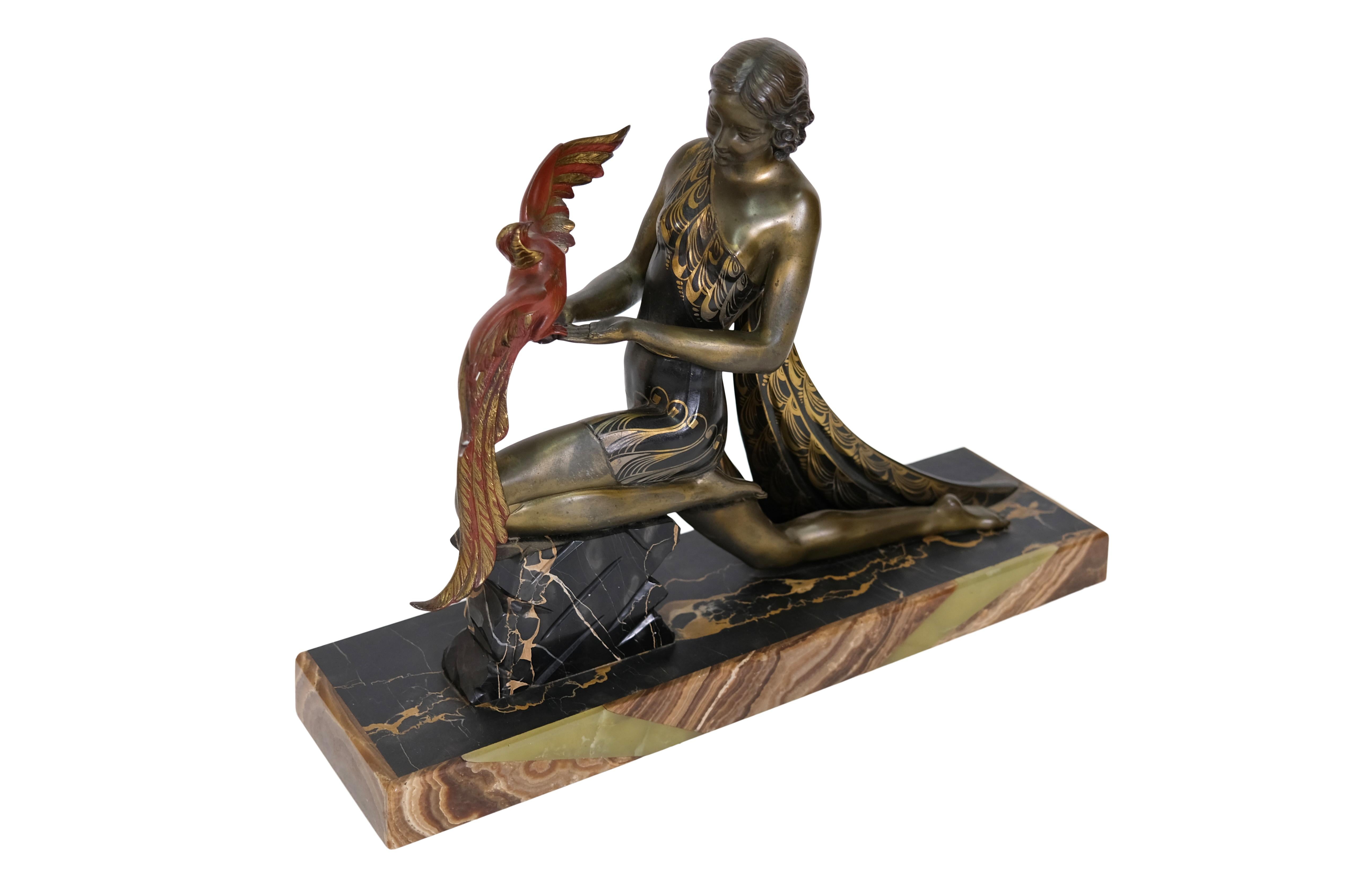 Sculpture of a girl with a bird by Jacques Limousin
Régule, with original colorful patina
Marble base

Original Art Deco, France 1930s

Measures: width: 60 cm
Height: 45 cm
Depth: 17 cm.