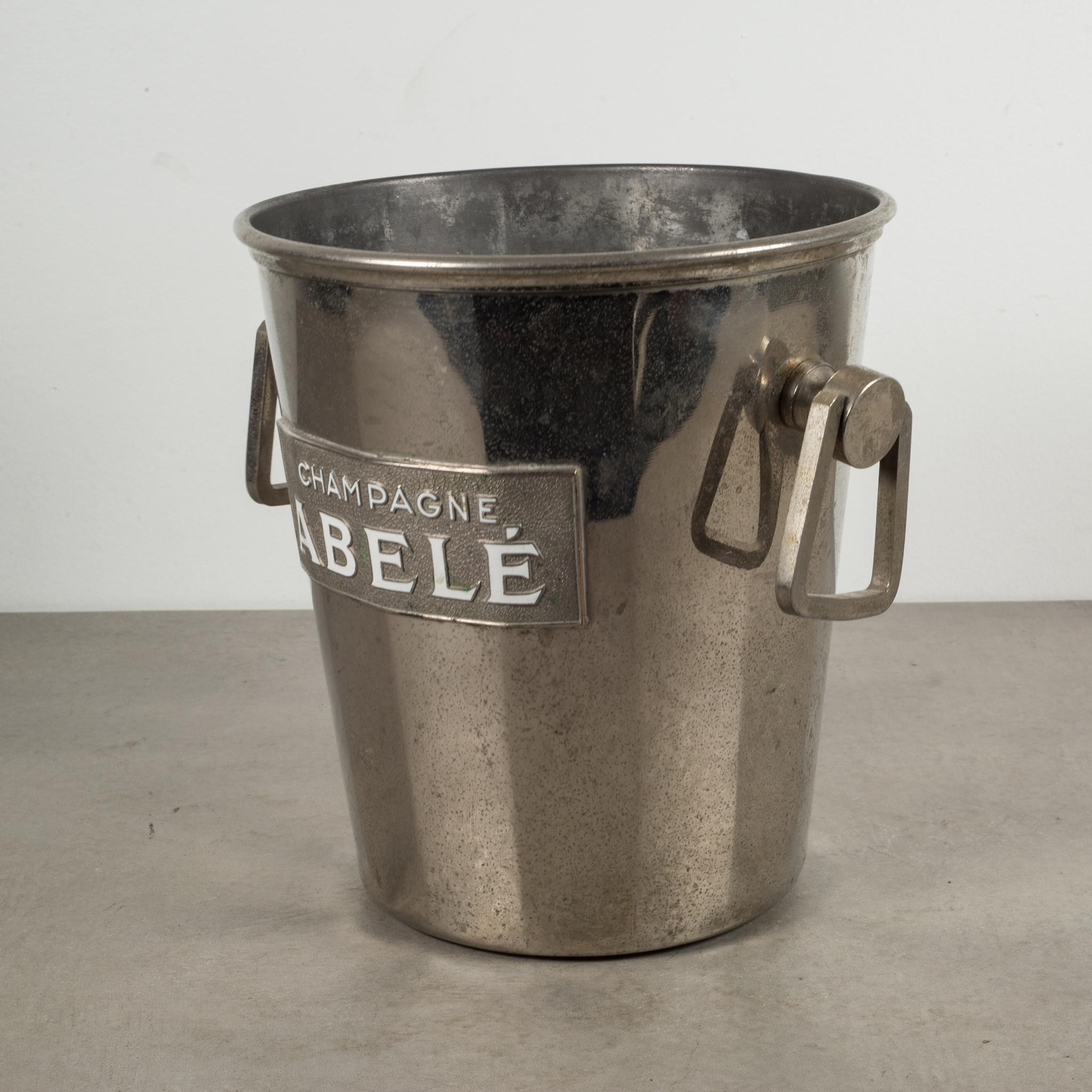About

An original Art Deco champagne advertising ice bucket with embossed lettering and grape leaf handles.

Creator: Champagne Mercier, France.
Date of manufacture: circa 1930s.
Materials and techniques: Metal.
Condition: Good. Wear