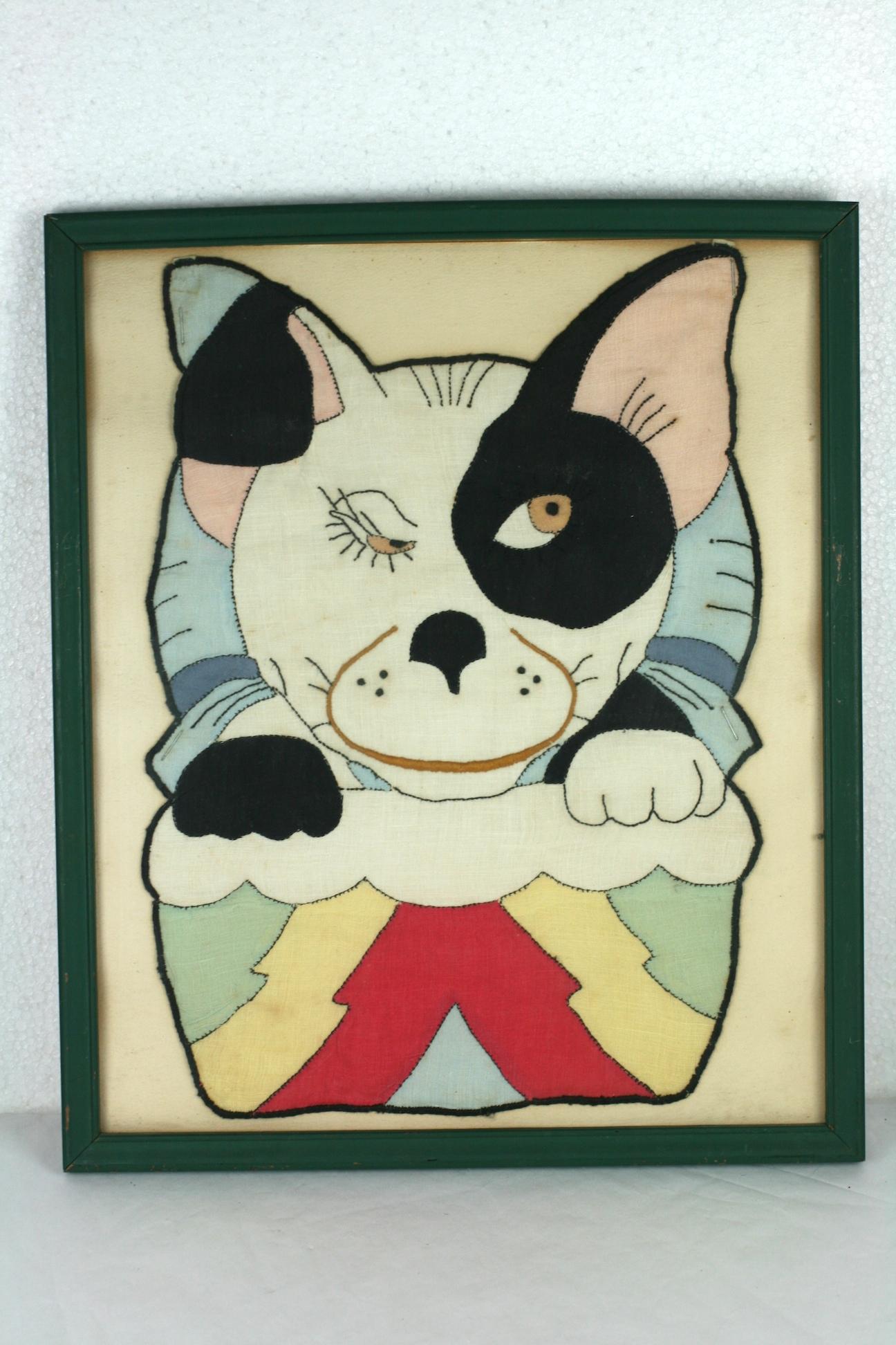Pair of Art Deco embroidered baby bib pictures from the 1930s. Amazingly graphic embroidered and pieced colored linen baby bibs in the form of cat in clown costume and a dog in an Art Deco bed.
Beautifully detailed and designed for use! By babies