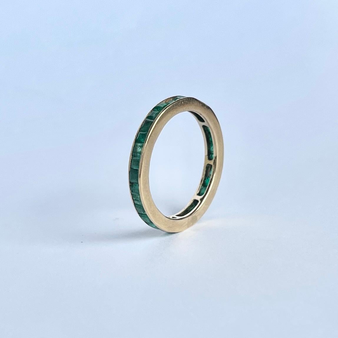 Women's Art Deco Emerald and 18 Carat Gold Eternity Band For Sale
