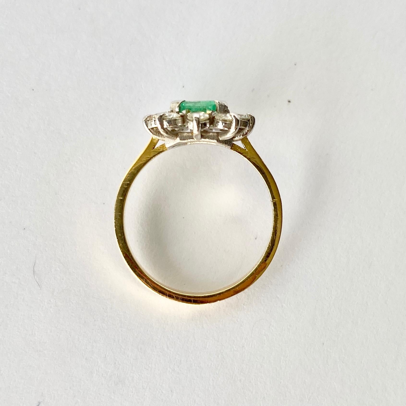 Sat at the centre of this gorgeous cluster is 70pt emerald and surrounding the wonderfully bright green stone are a halo of sparkling diamonds measuring a total of 60pts. 

Ring Size: L 1/2 or 6 
Cluster Diameter: 13mm

Weight: 3.3g