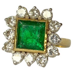 Art Deco Emerald and Diamond 18 Carat Gold Cluster Ring