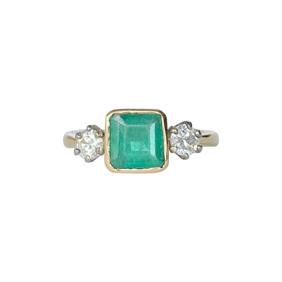 Art Deco Emerald and Diamond 18 Carat Gold Three-Stone Ring