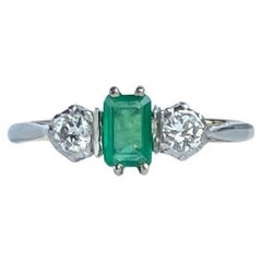 Art Deco Emerald and Diamond 18 Carat Gold Three-Stone Ring